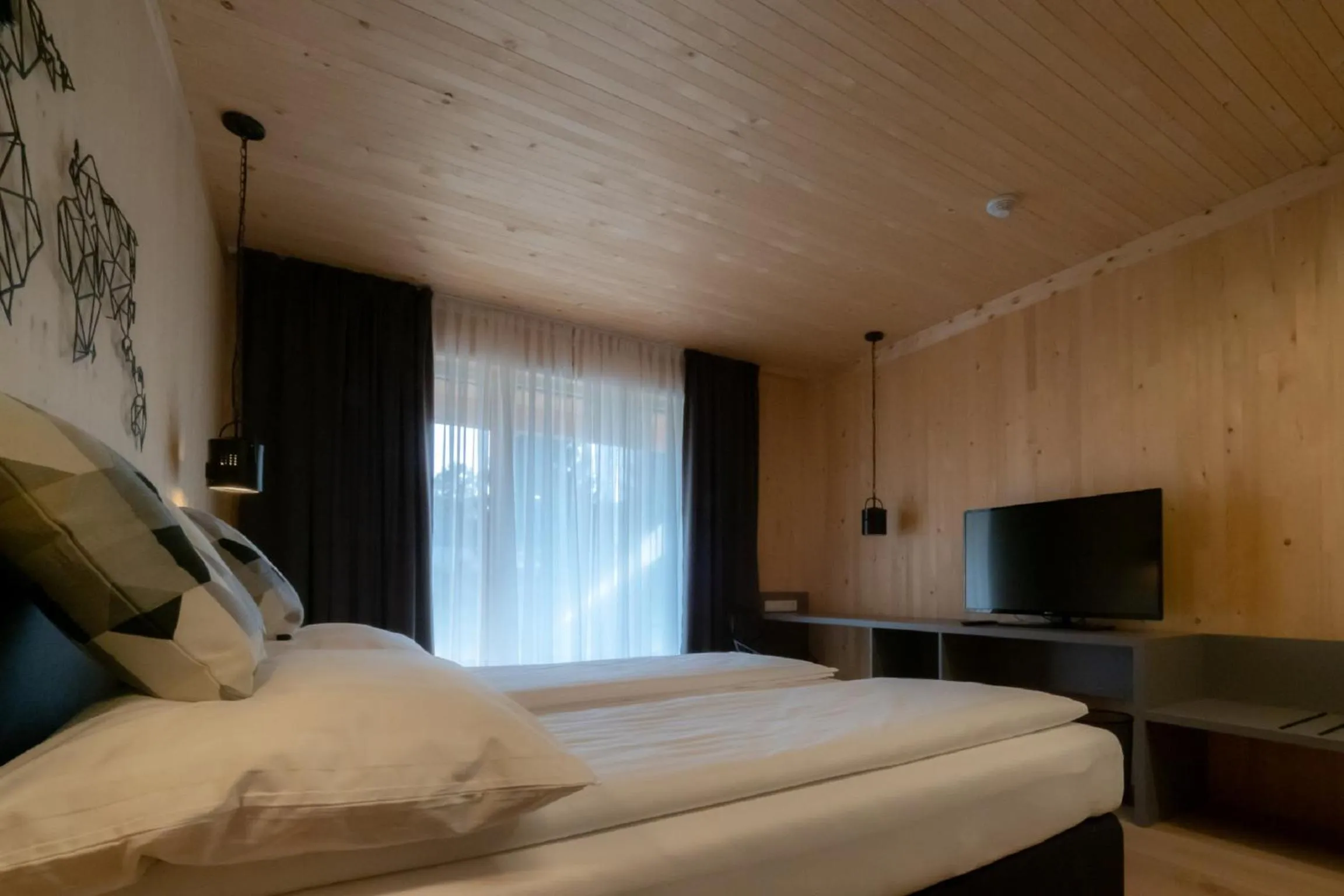 TV and multimedia, Bed in GästeHAUS & HOFladen Familie Öllerer