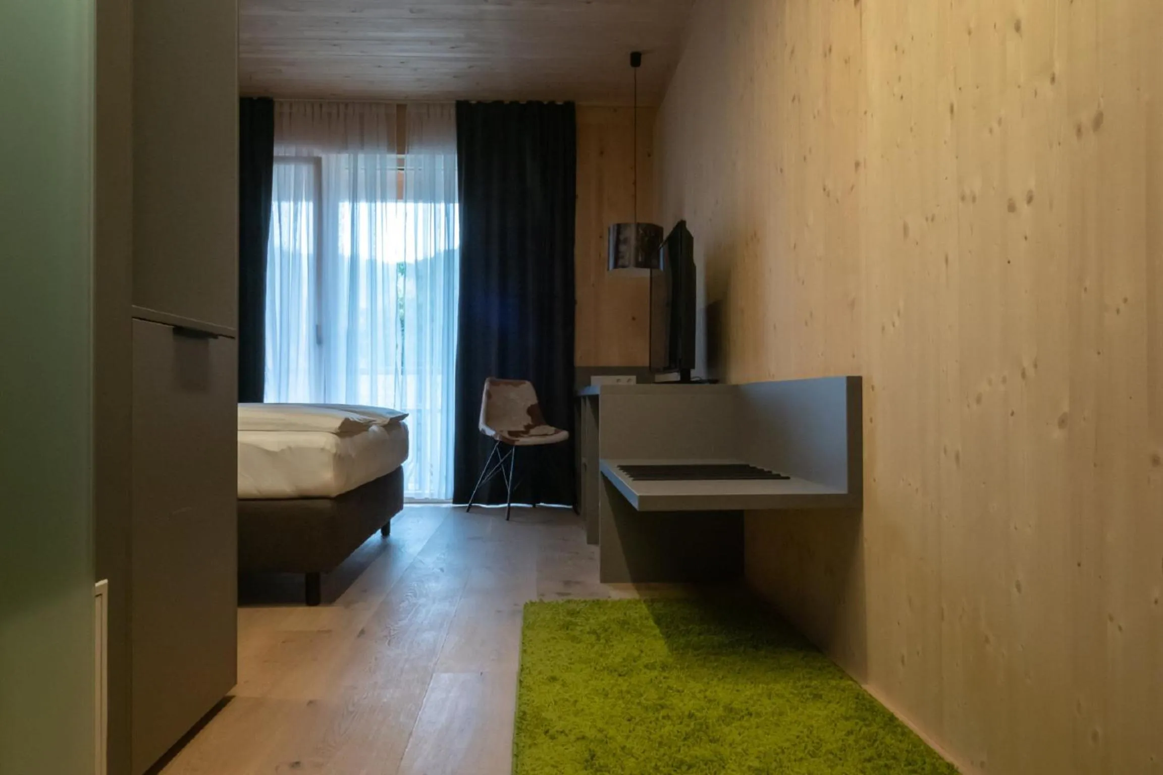 Photo of the whole room, Bed in GästeHAUS & HOFladen Familie Öllerer