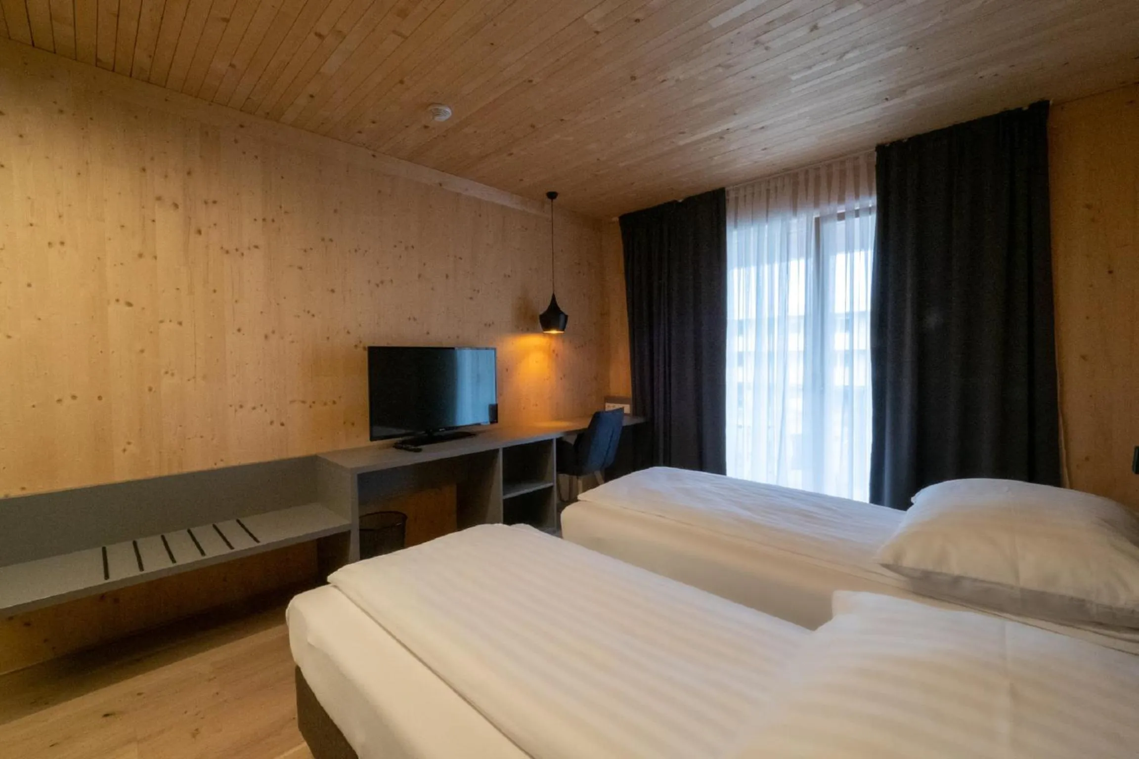 TV and multimedia, Bed in GästeHAUS & HOFladen Familie Öllerer