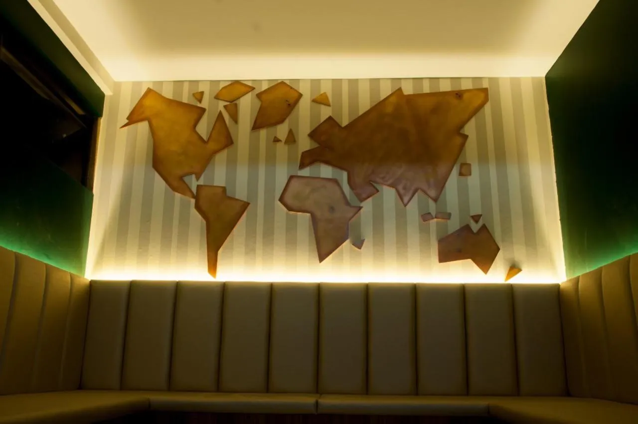 Communal lounge/ TV room in Murano Center Hotel