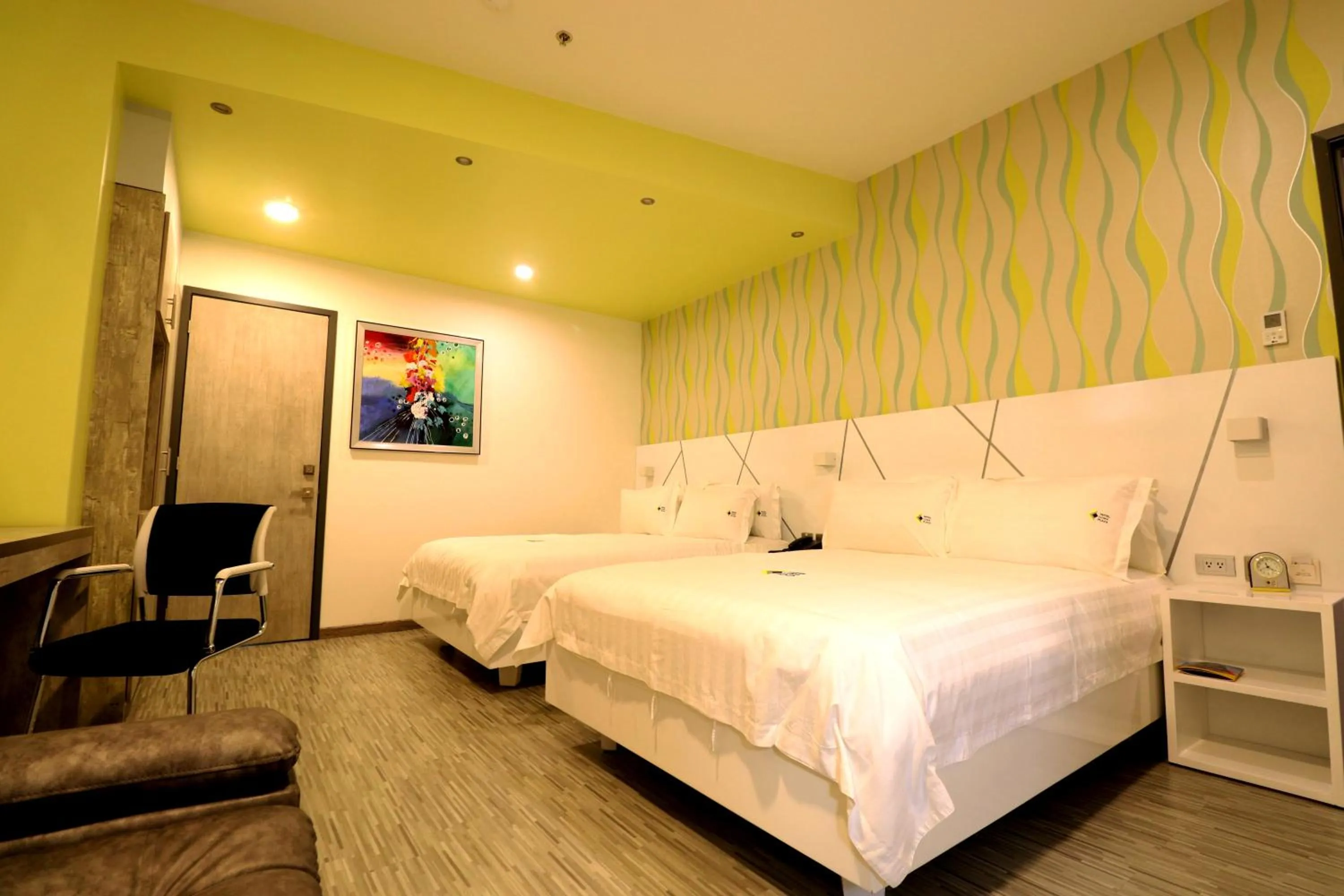 Bed in Luma Plaza Hotel