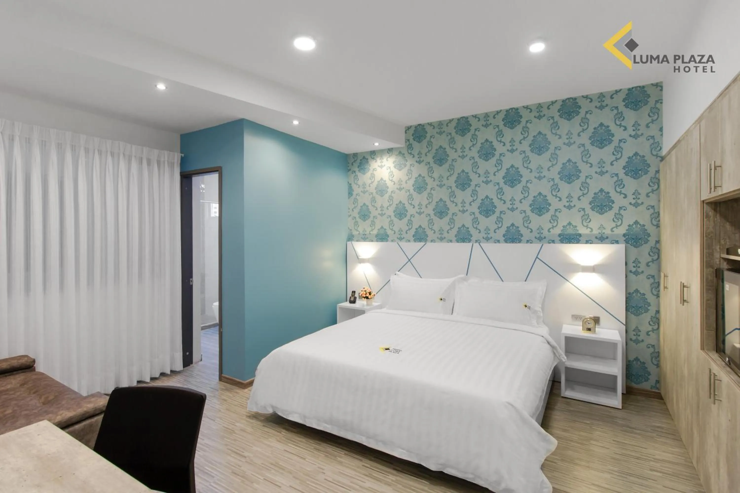 Photo of the whole room, Bed in Luma Plaza Hotel