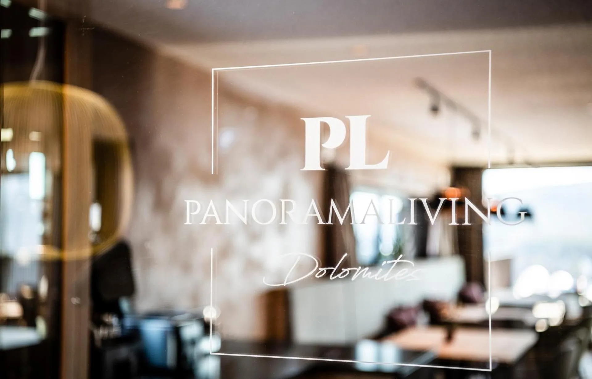 Property logo or sign in Aparthotel Panorama Living Dolomites