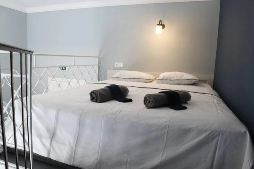 Bed in Troon of Athens Apartments