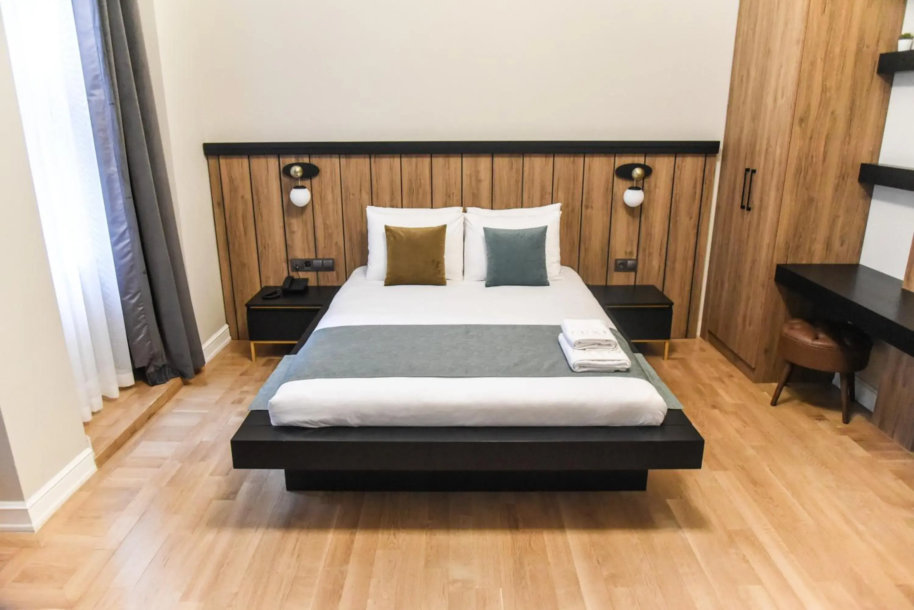 Bed in LUXIR HOTEL Bed in LUXIR HOTEL