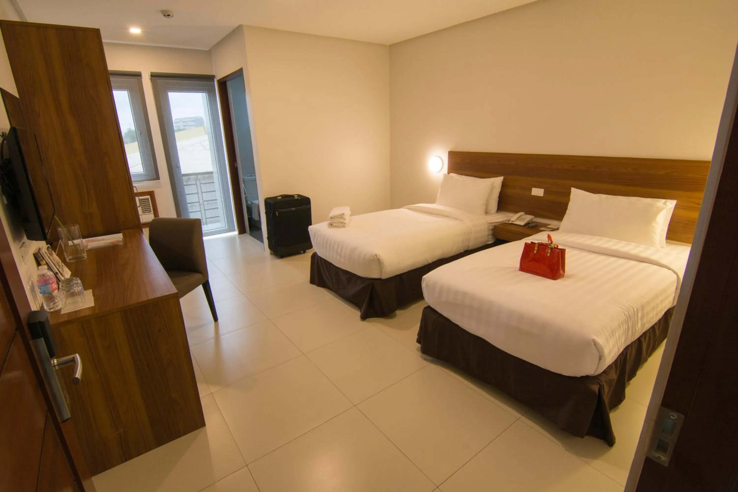 Bed in Mango Suites Cauayan