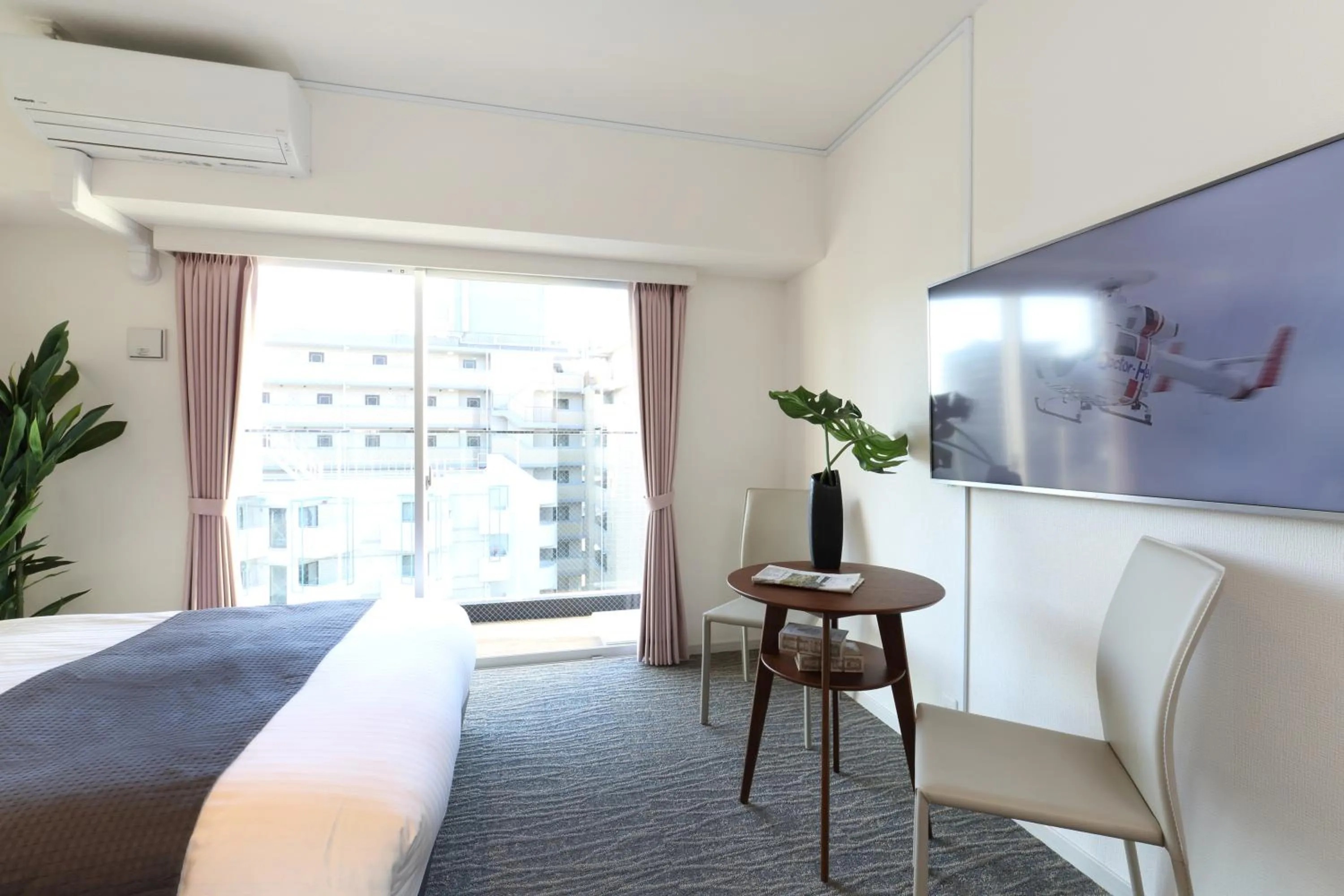 Living room, Bed in Residence Hotel Hakata 20