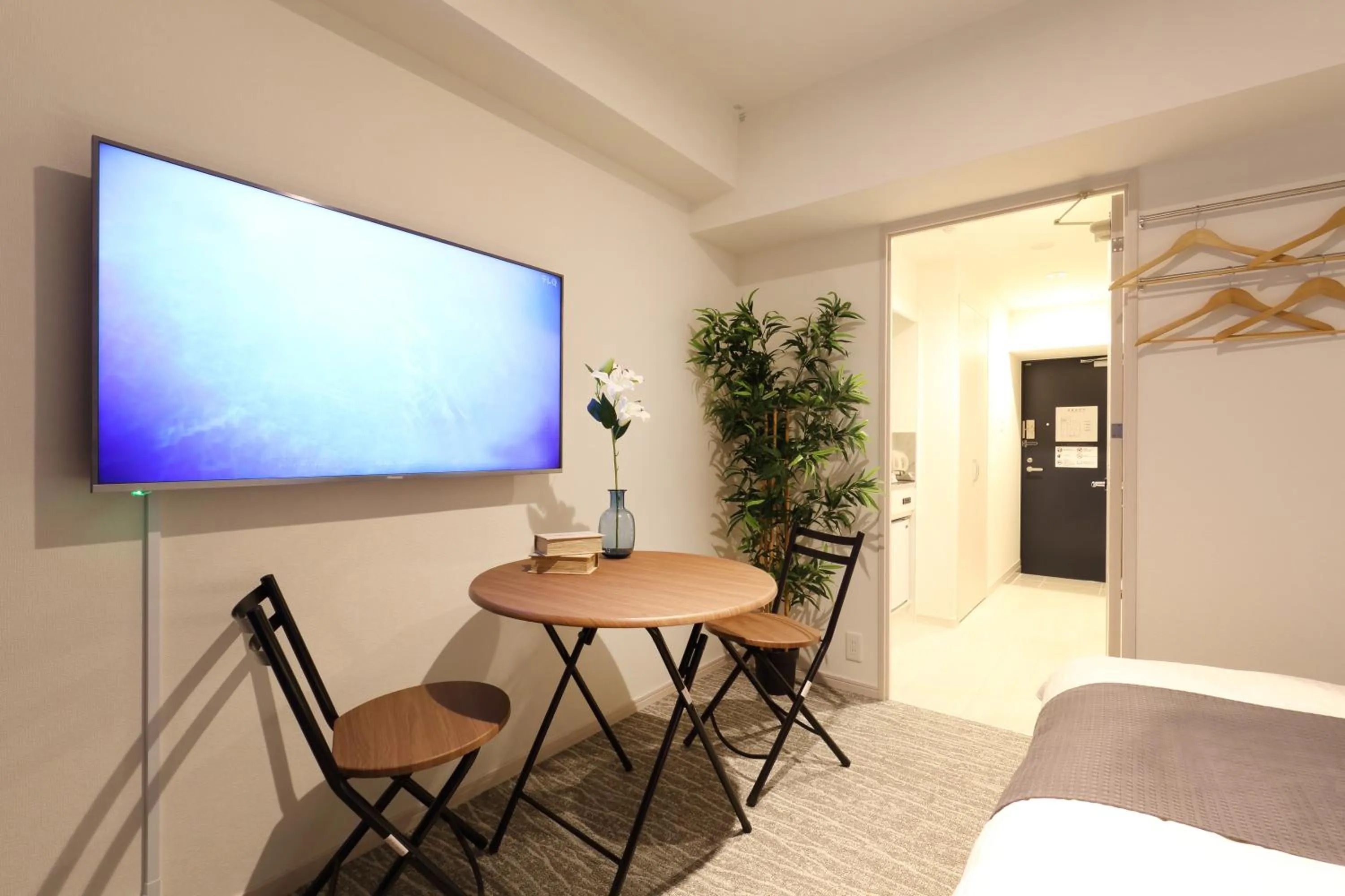 Living room, Bed in Residence Hotel Hakata 20