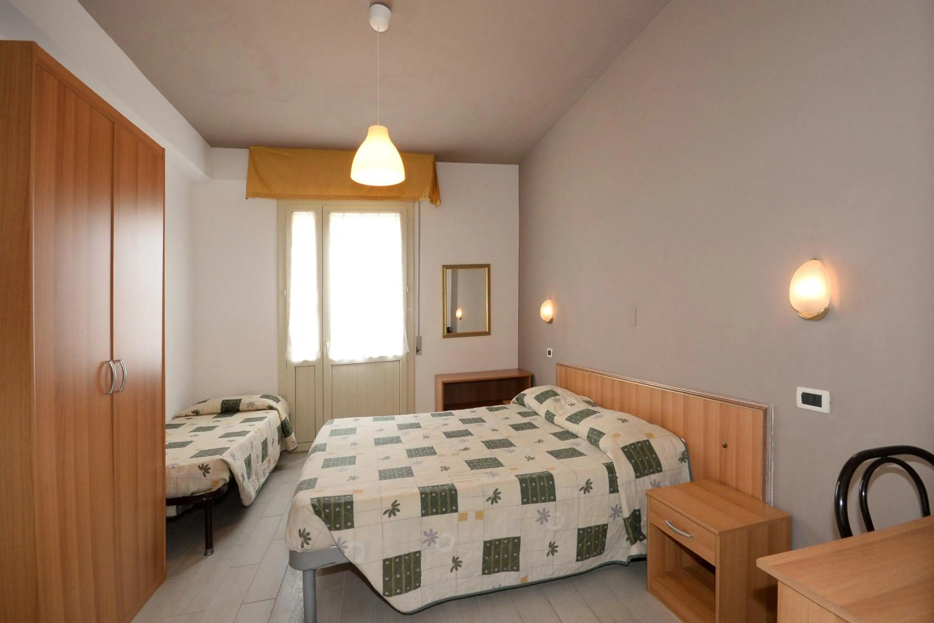 Bed in Hotel Al Ragno