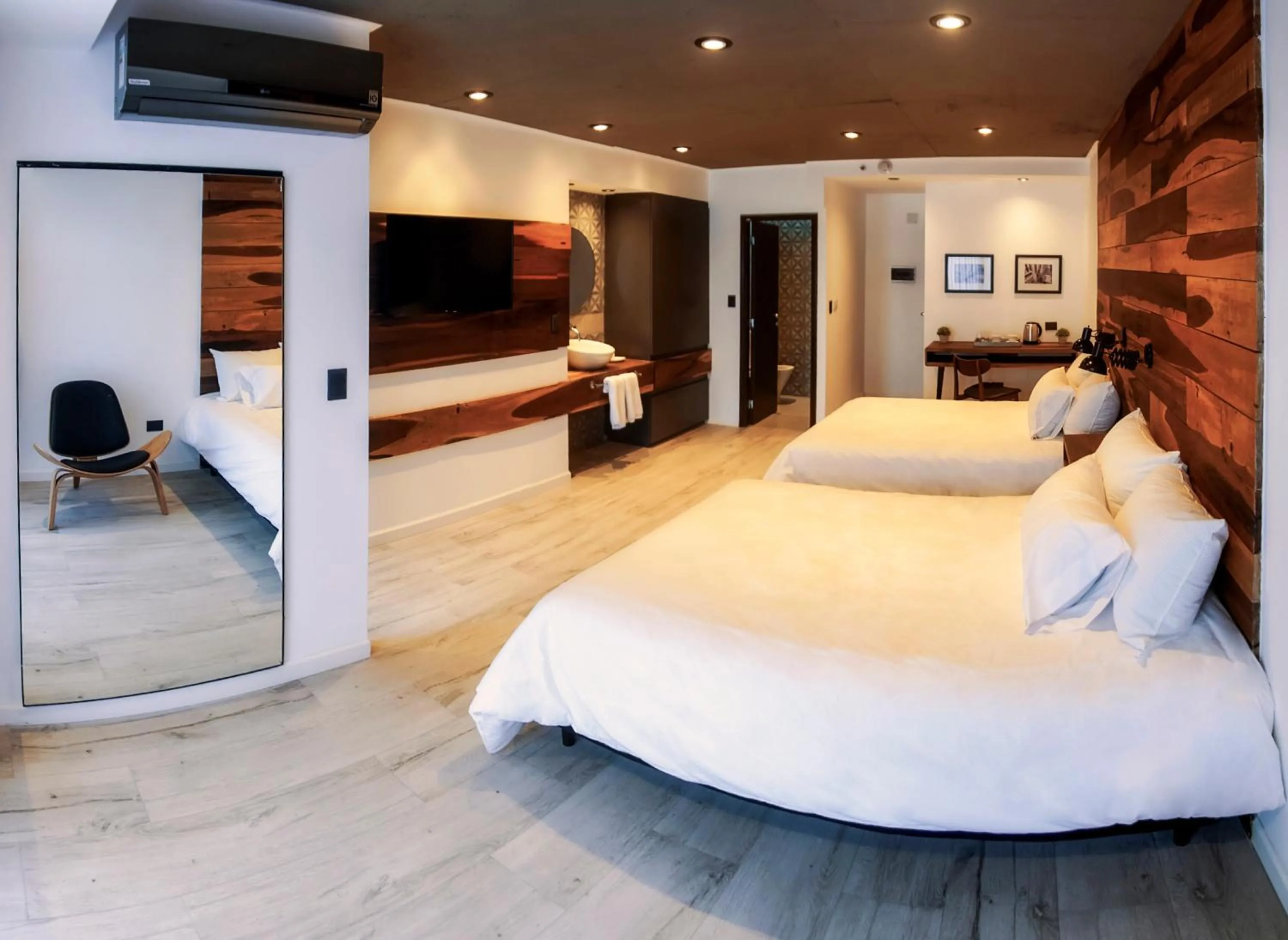 Bed in La Urumpta Hotel, AKEN MIND