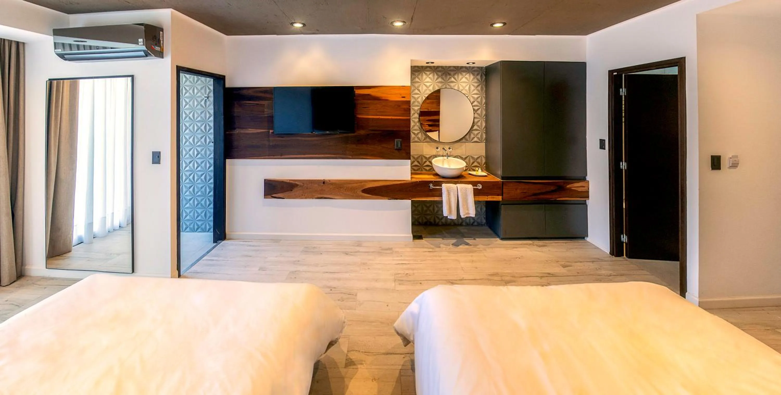 Bed in La Urumpta Hotel, AKEN MIND