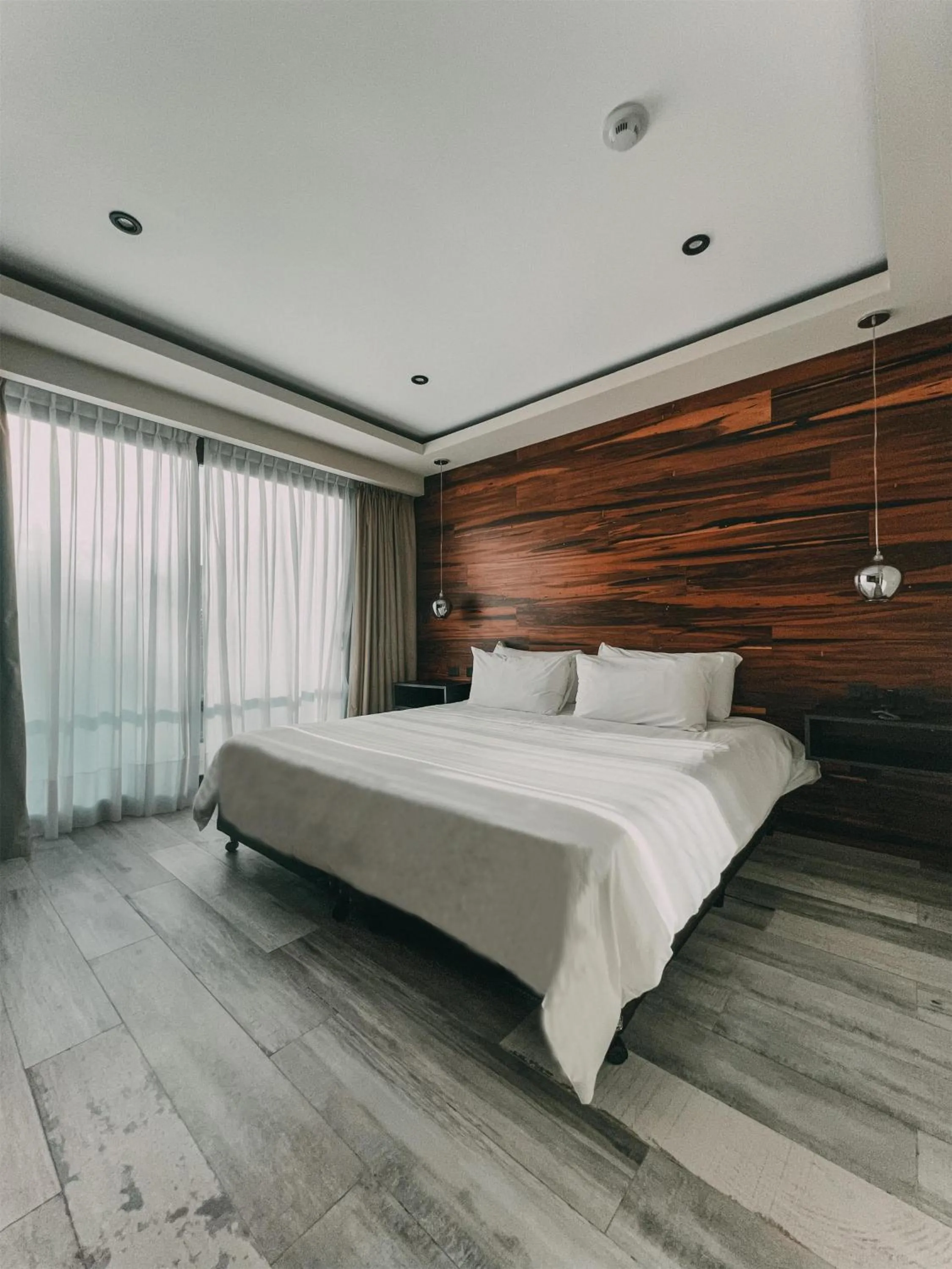 Photo of the whole room, Bed in La Urumpta Hotel, AKEN MIND