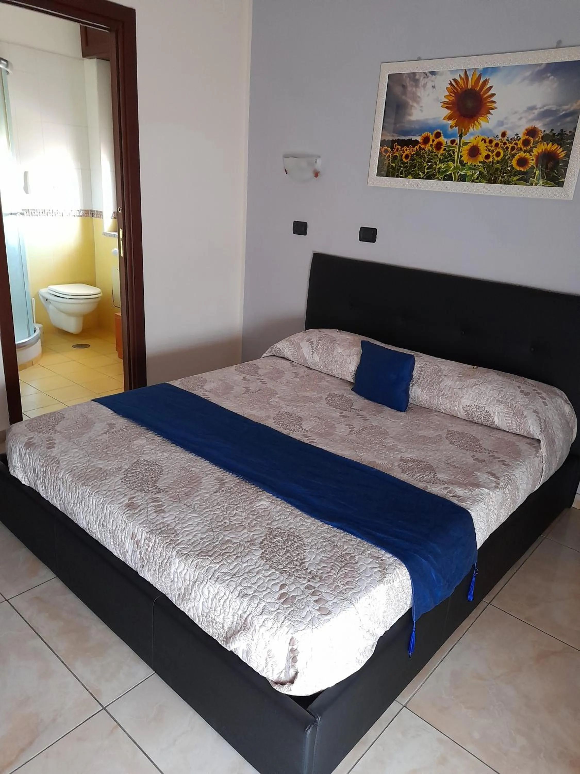 Bed in Hotel De Rosa