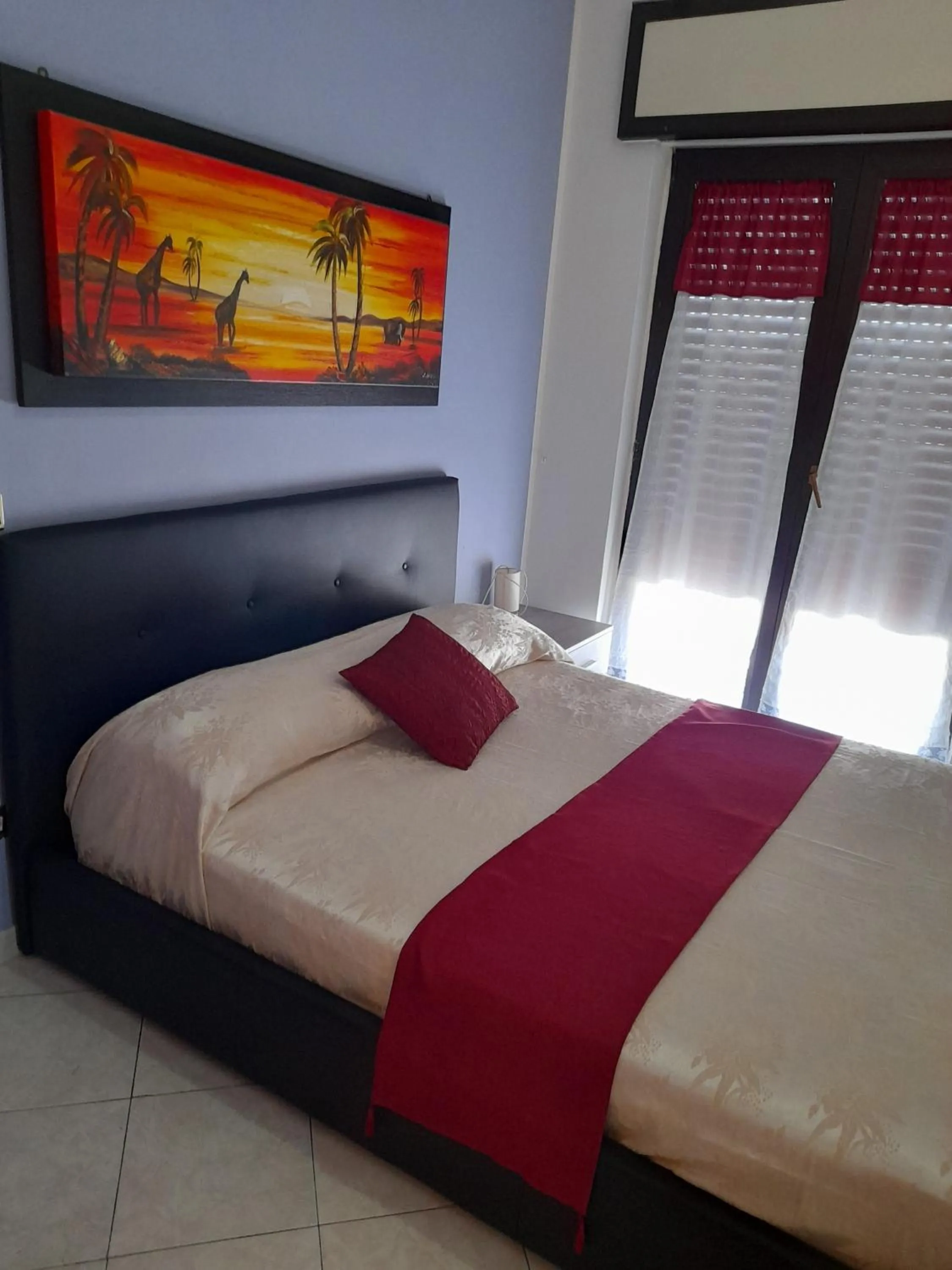 Bed in Hotel De Rosa