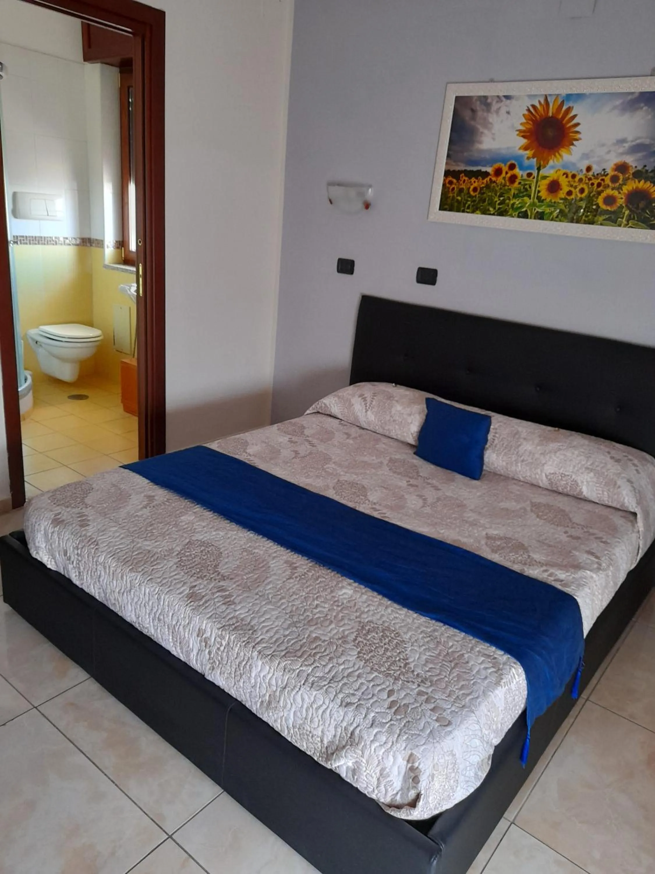 Bed in Hotel De Rosa