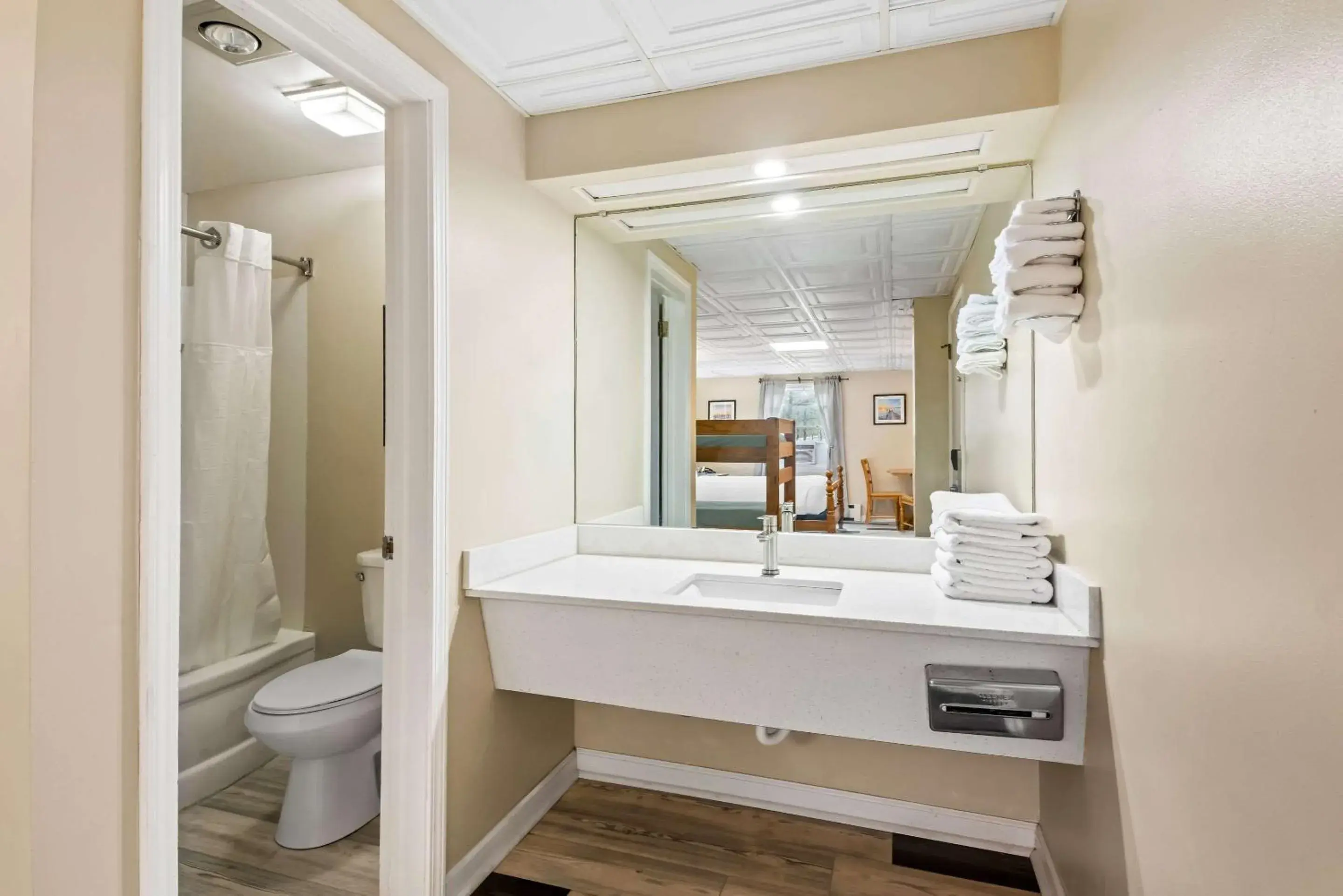 Bedroom in Rodeway Inn Formerly Camp Inn Lodge Bedroom in Rodeway Inn Formerly Camp Inn Lodge