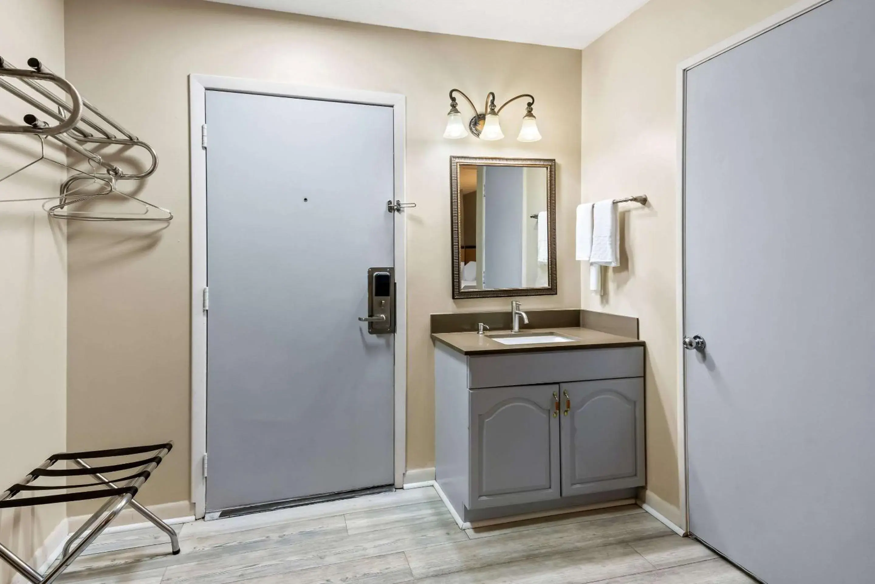 Bedroom in Rodeway Inn Formerly Camp Inn Lodge Bedroom in Rodeway Inn Formerly Camp Inn Lodge