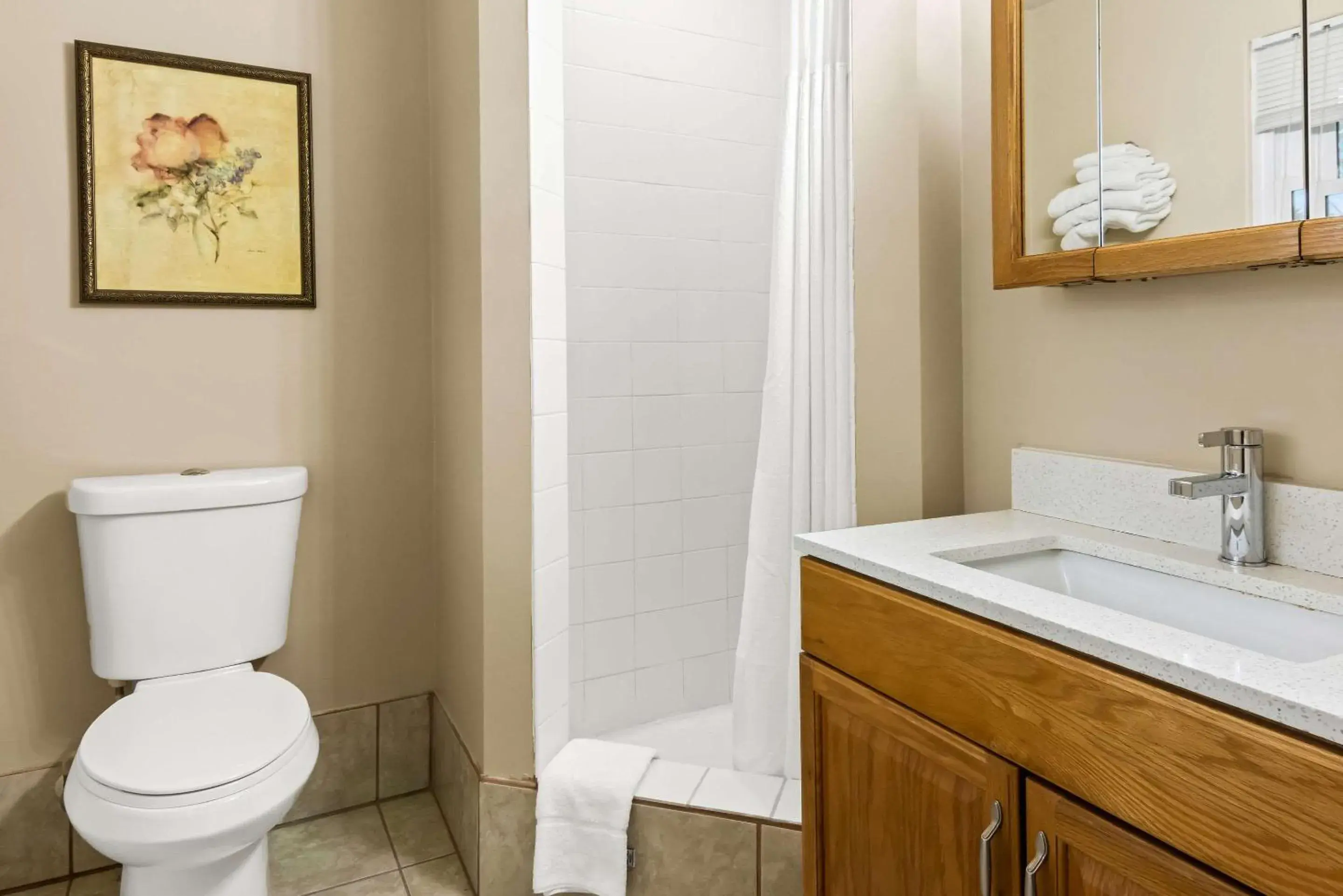 Bedroom in Rodeway Inn Formerly Camp Inn Lodge Bedroom in Rodeway Inn Formerly Camp Inn Lodge