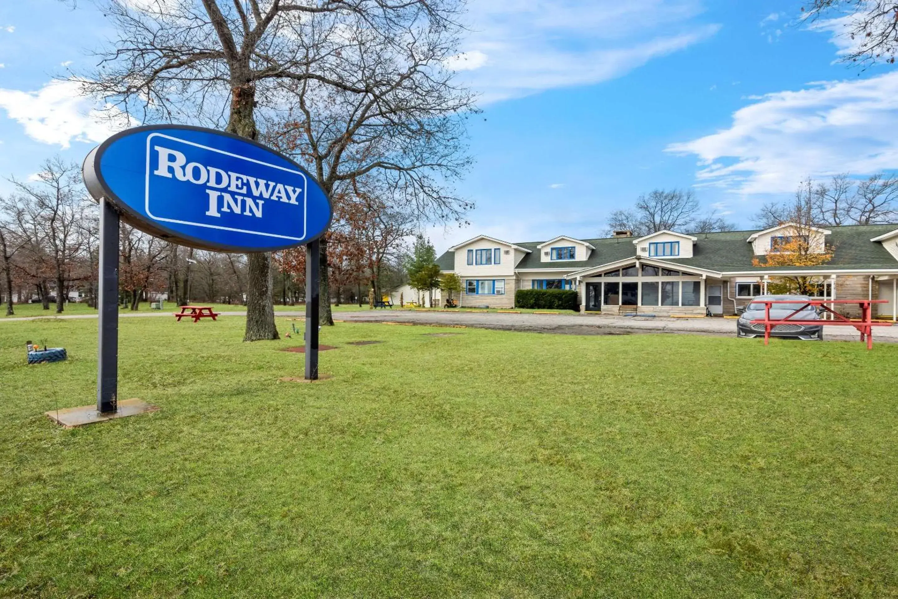 Property building in Rodeway Inn Formerly Camp Inn Lodge Property building in Rodeway Inn Formerly Camp Inn Lodge