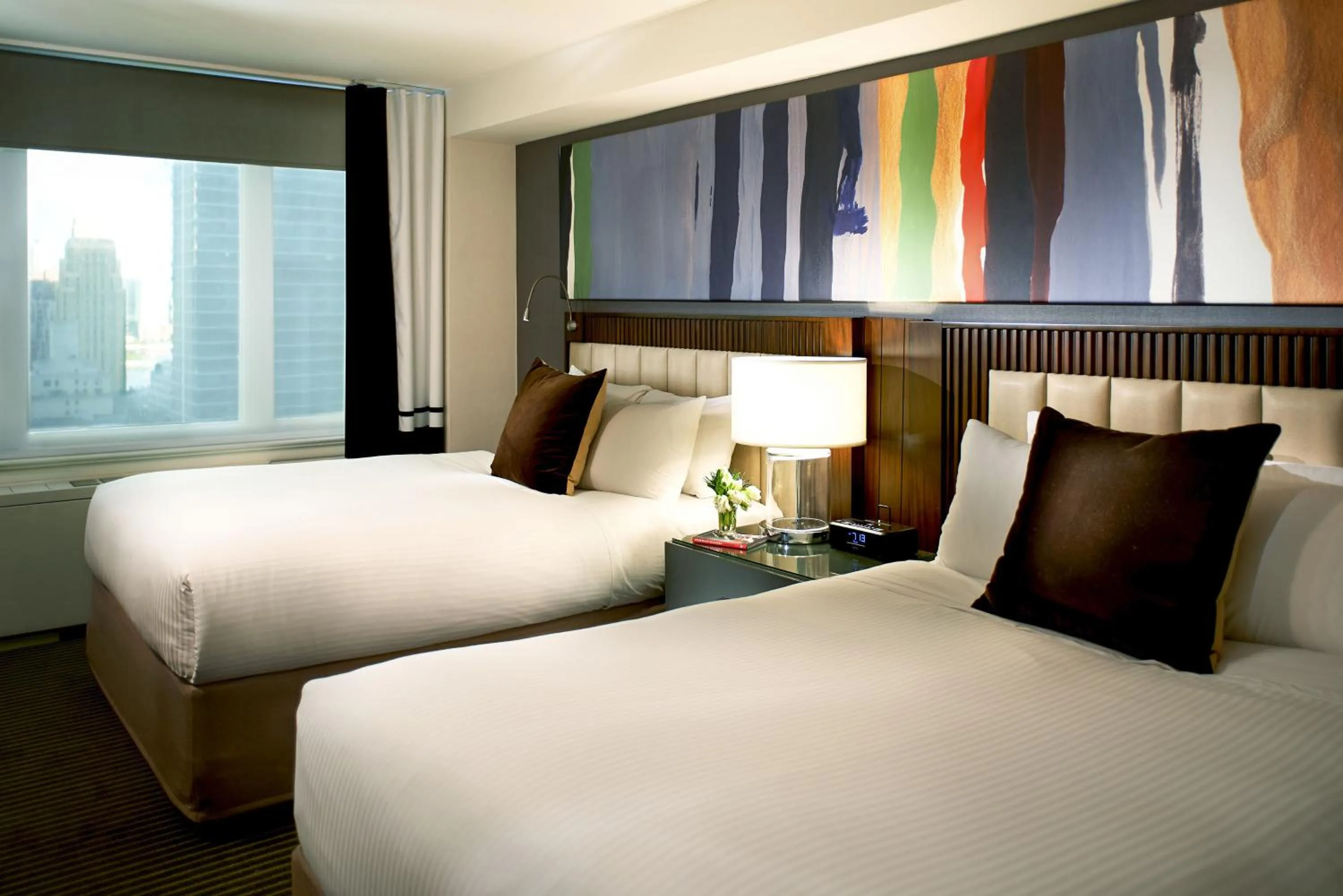 Photo of the whole room, Bed in The Fifty Sonesta Hotel New York