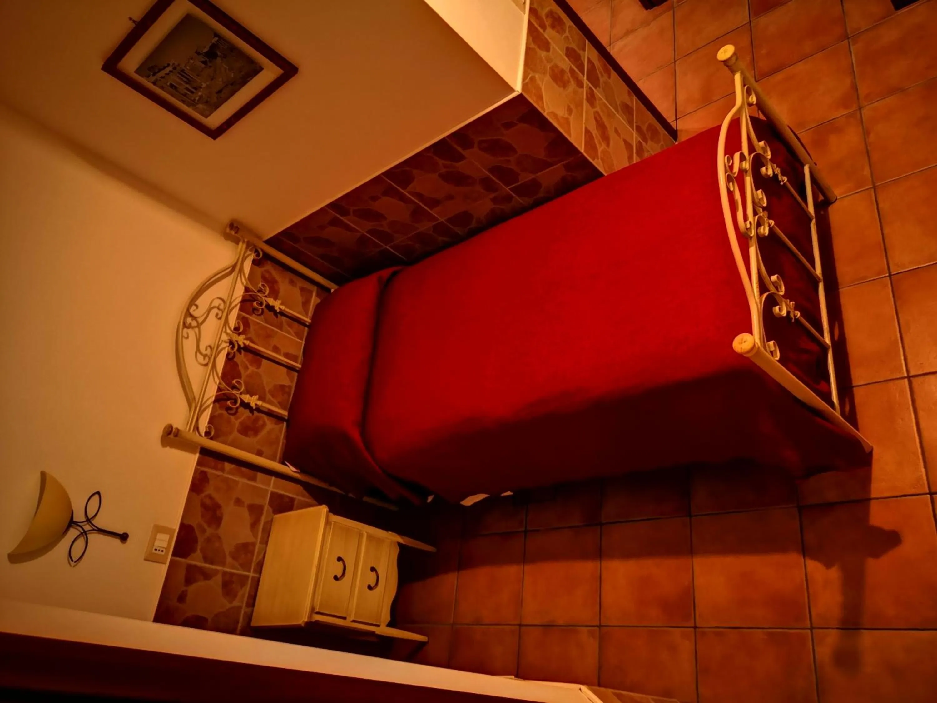 Bedroom in Vecchia Roma Resort