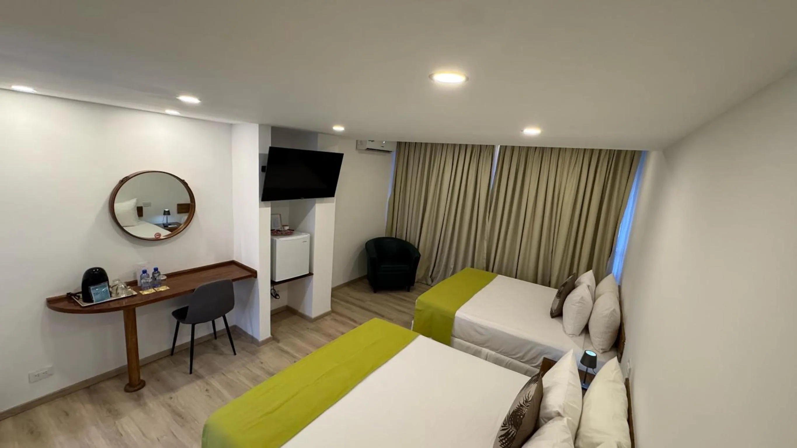 Bed in Aquarius Hotel Boutique