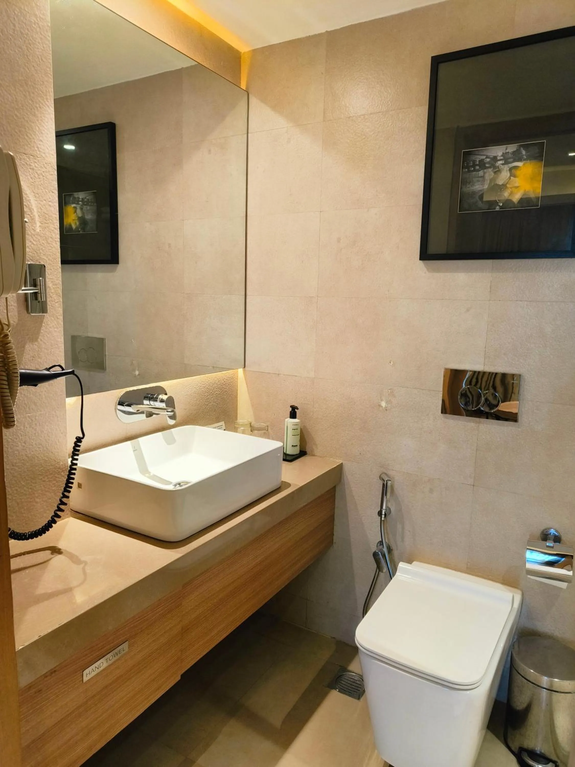 Toilet in Royal Hometel Suites