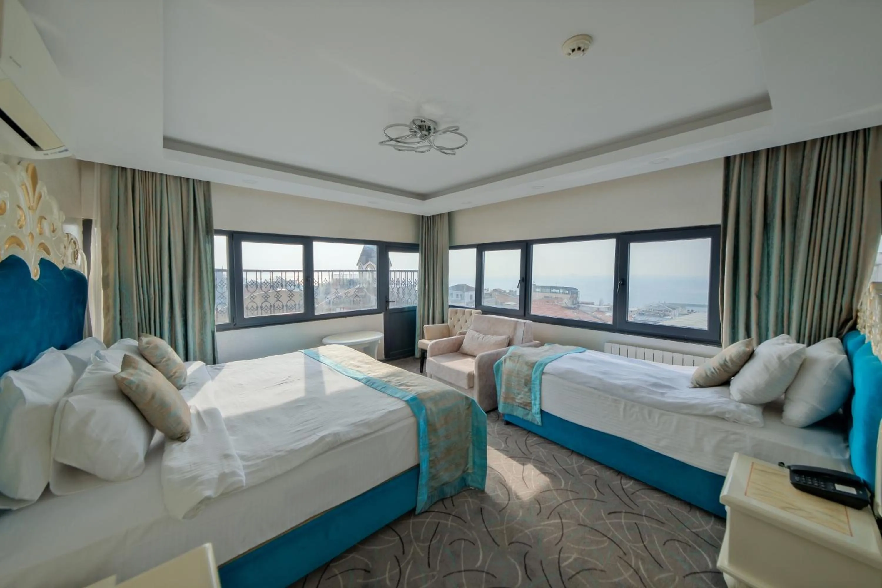 Bed in Grand Kavi Hotel