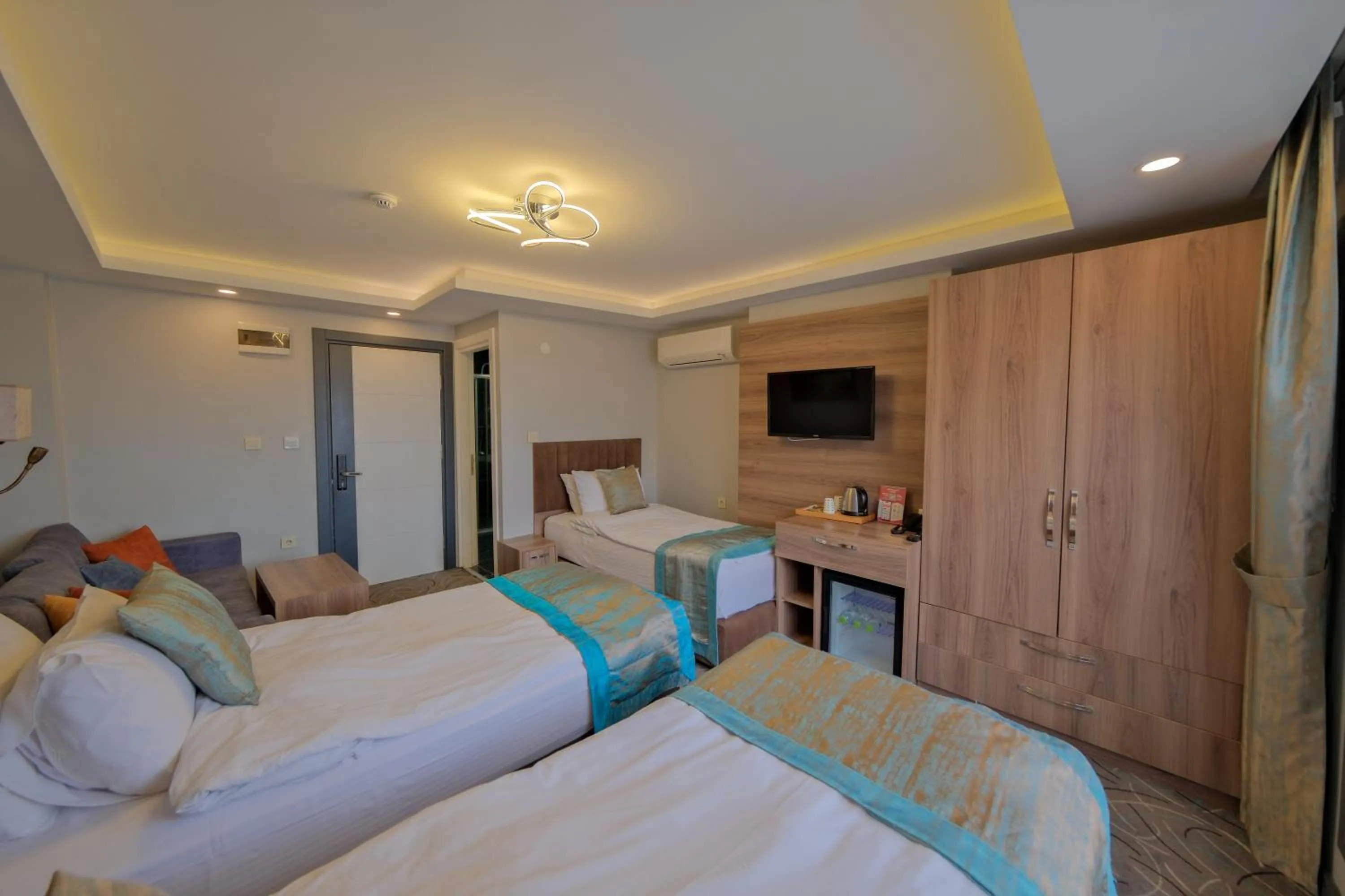 Bed in Grand Kavi Hotel