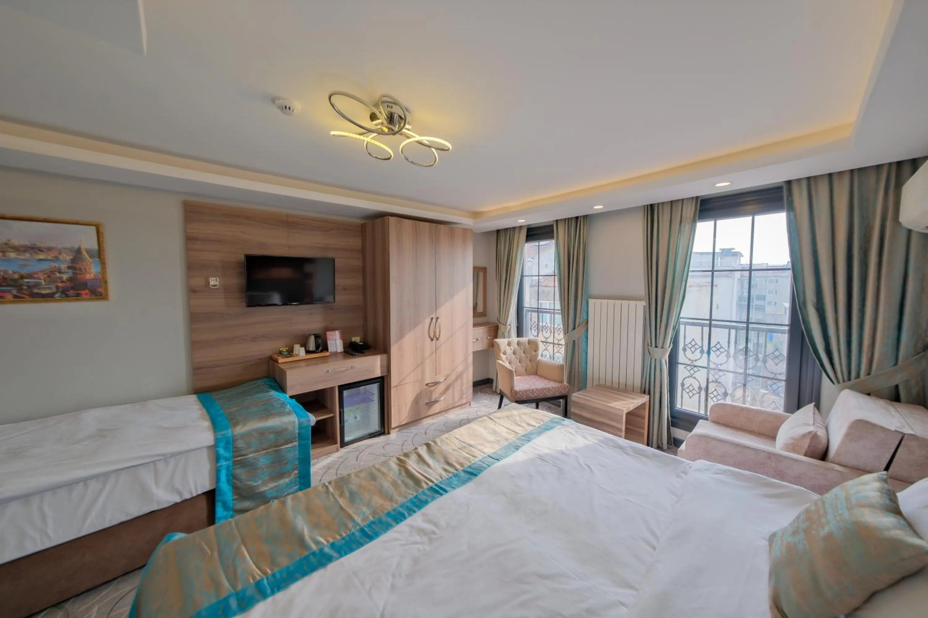 Bed in Grand Kavi Hotel