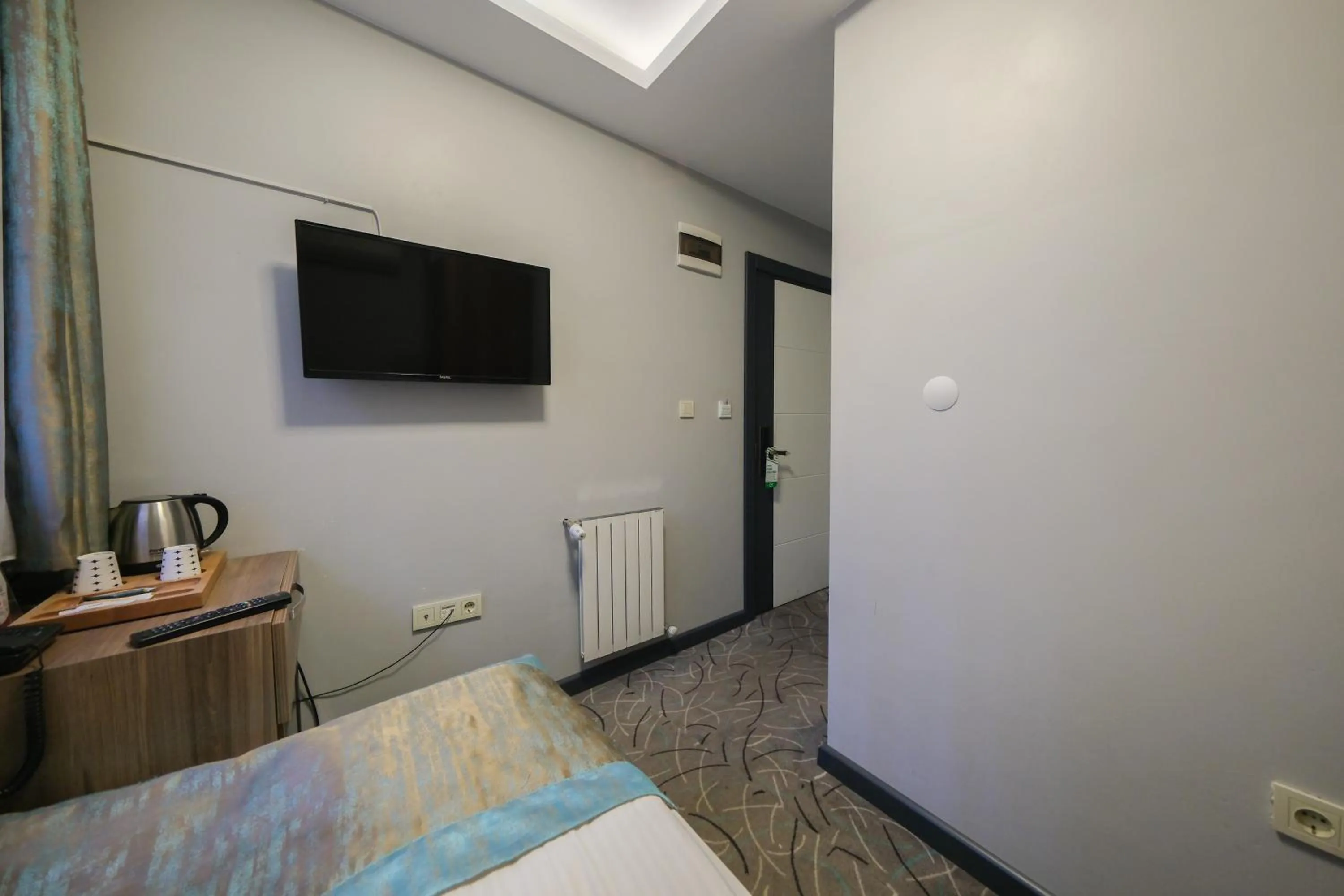 Bed in Grand Kavi Hotel