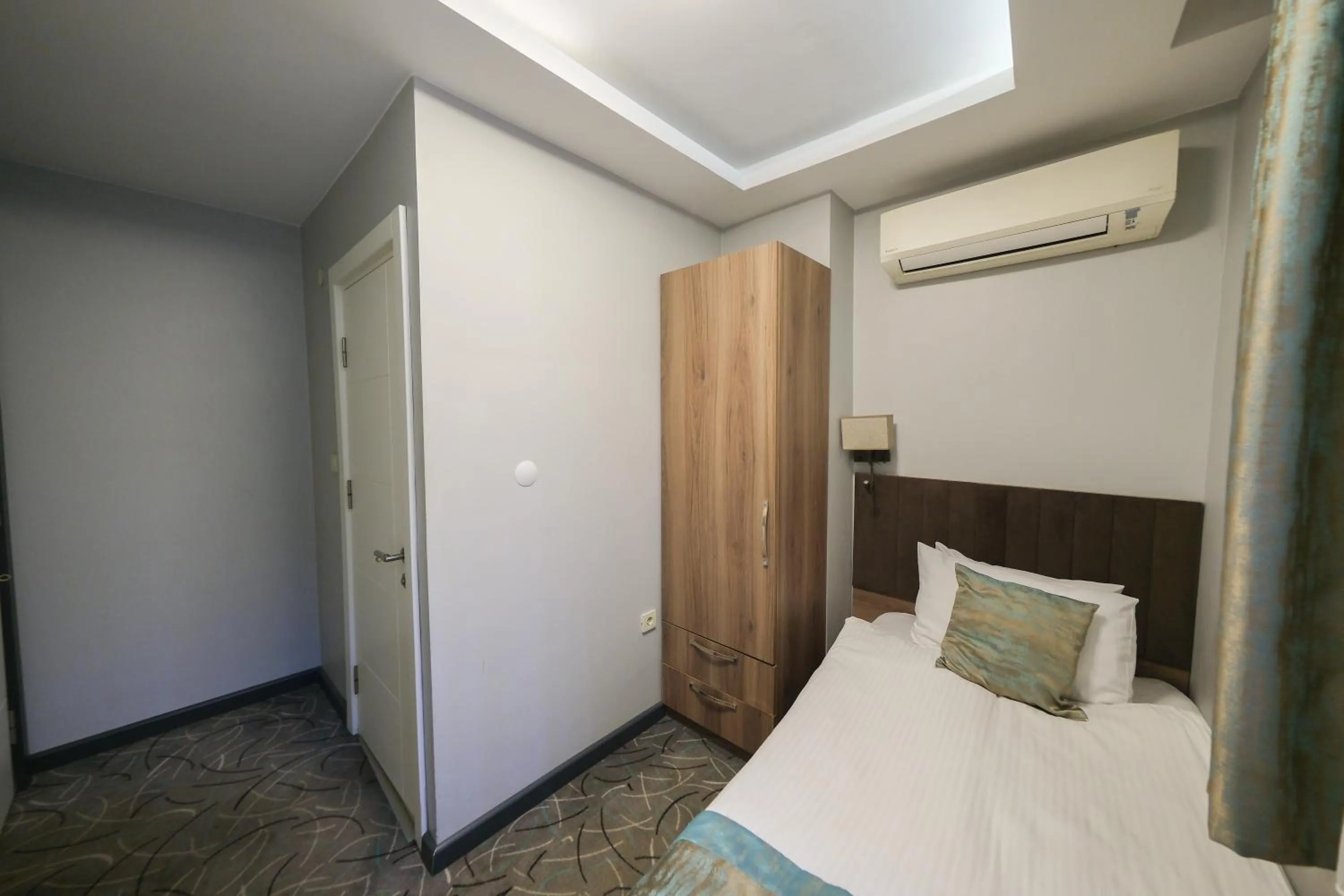 Bed in Grand Kavi Hotel