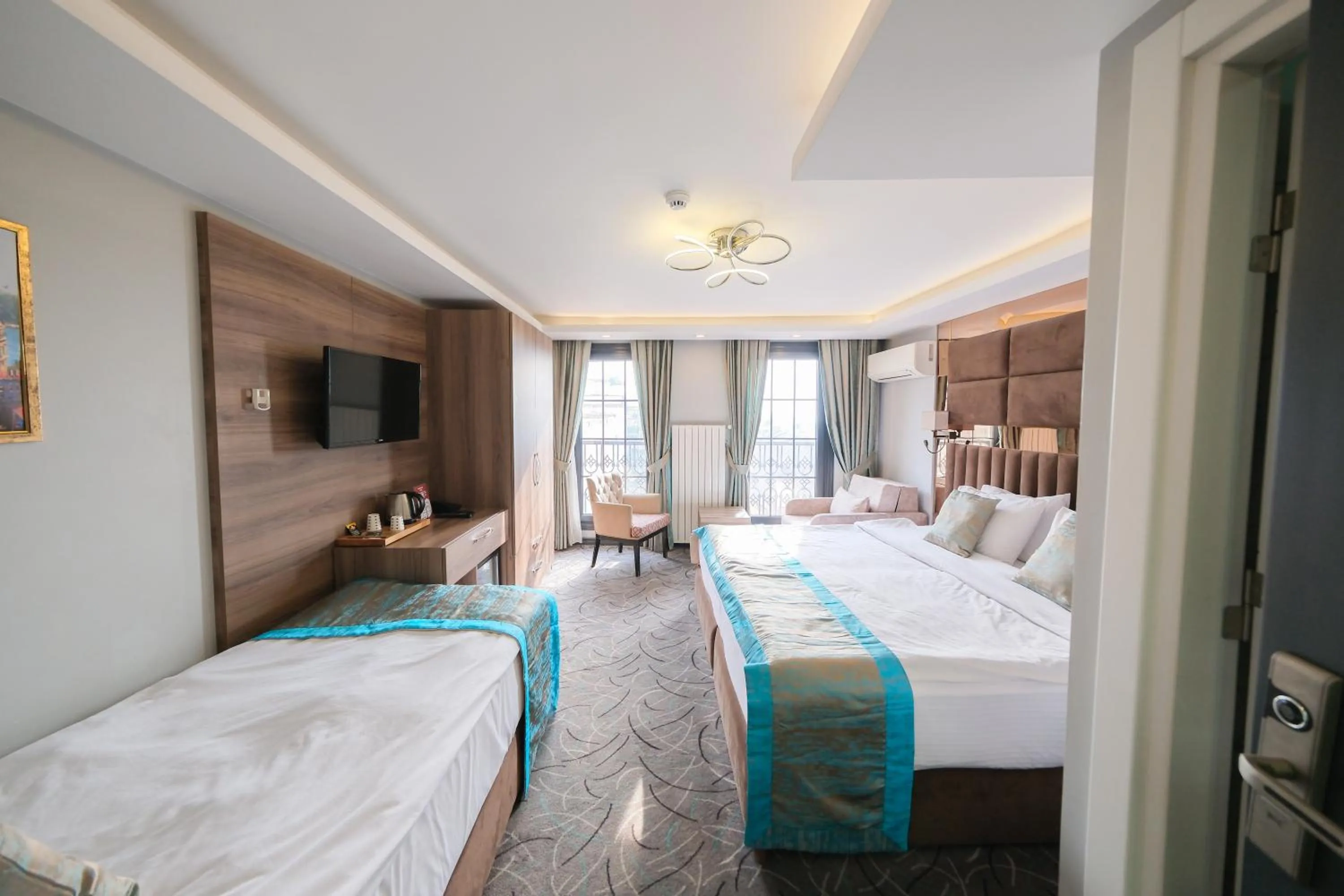 Bed in Grand Kavi Hotel