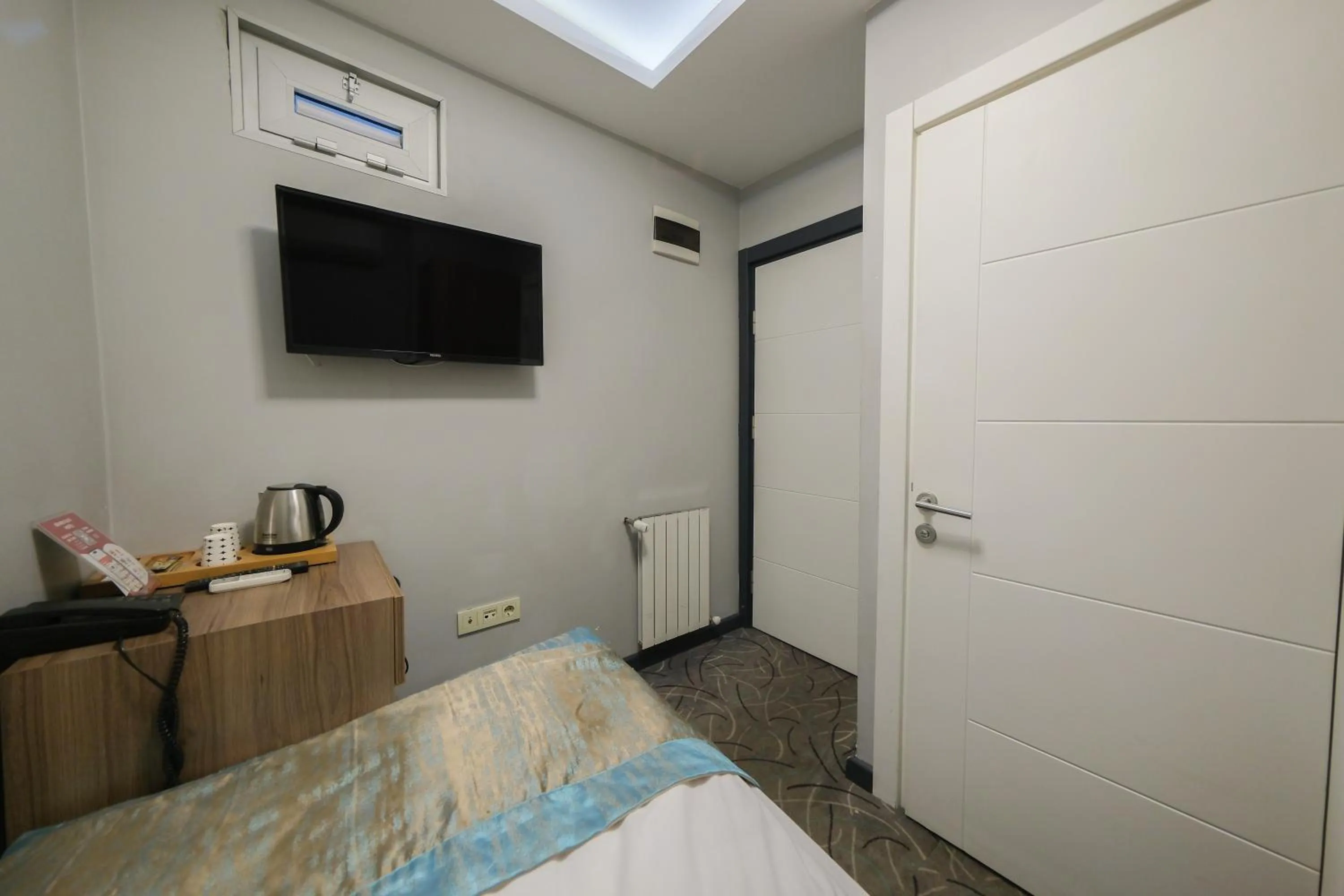 Bed in Grand Kavi Hotel