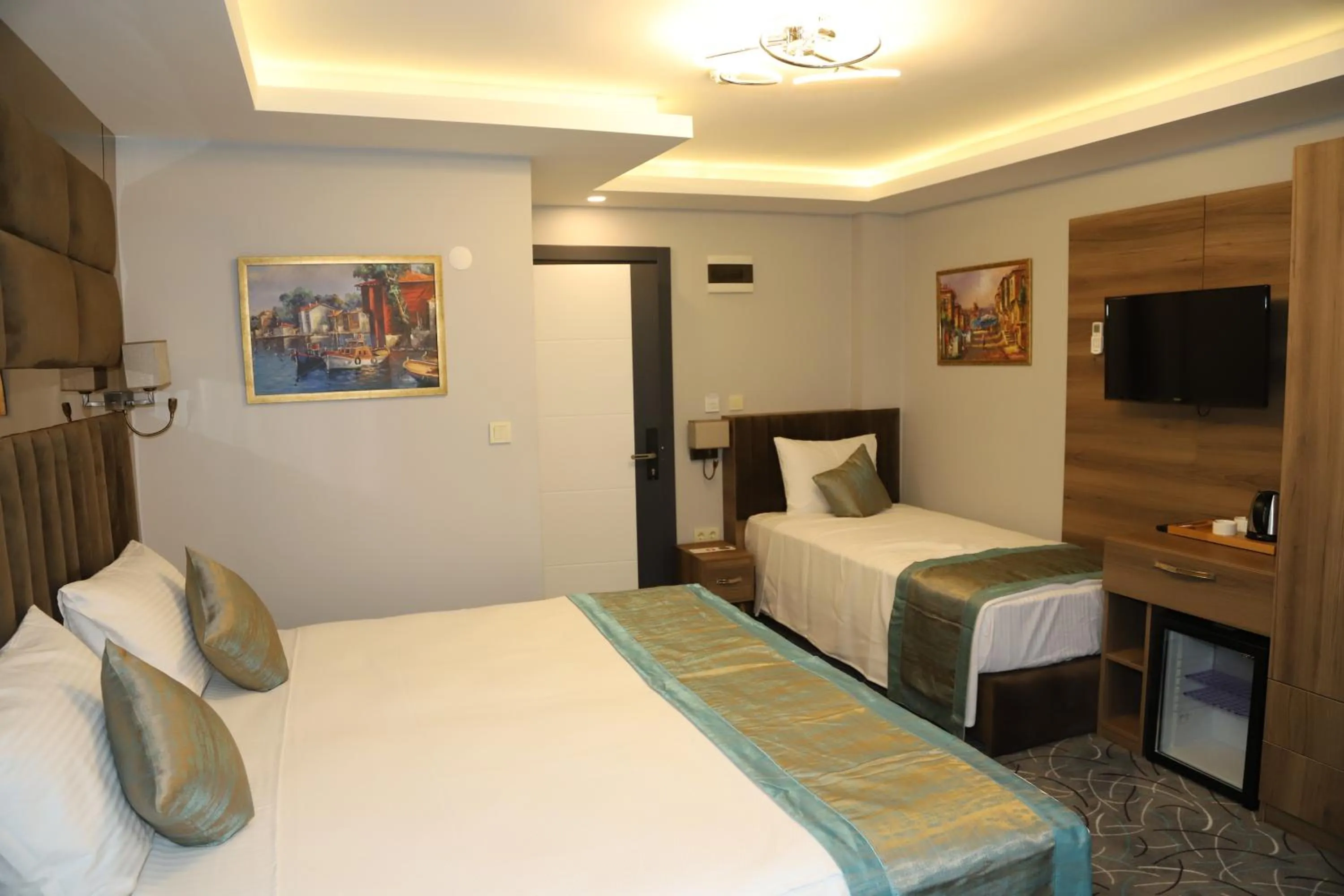 Bed in Grand Kavi Hotel