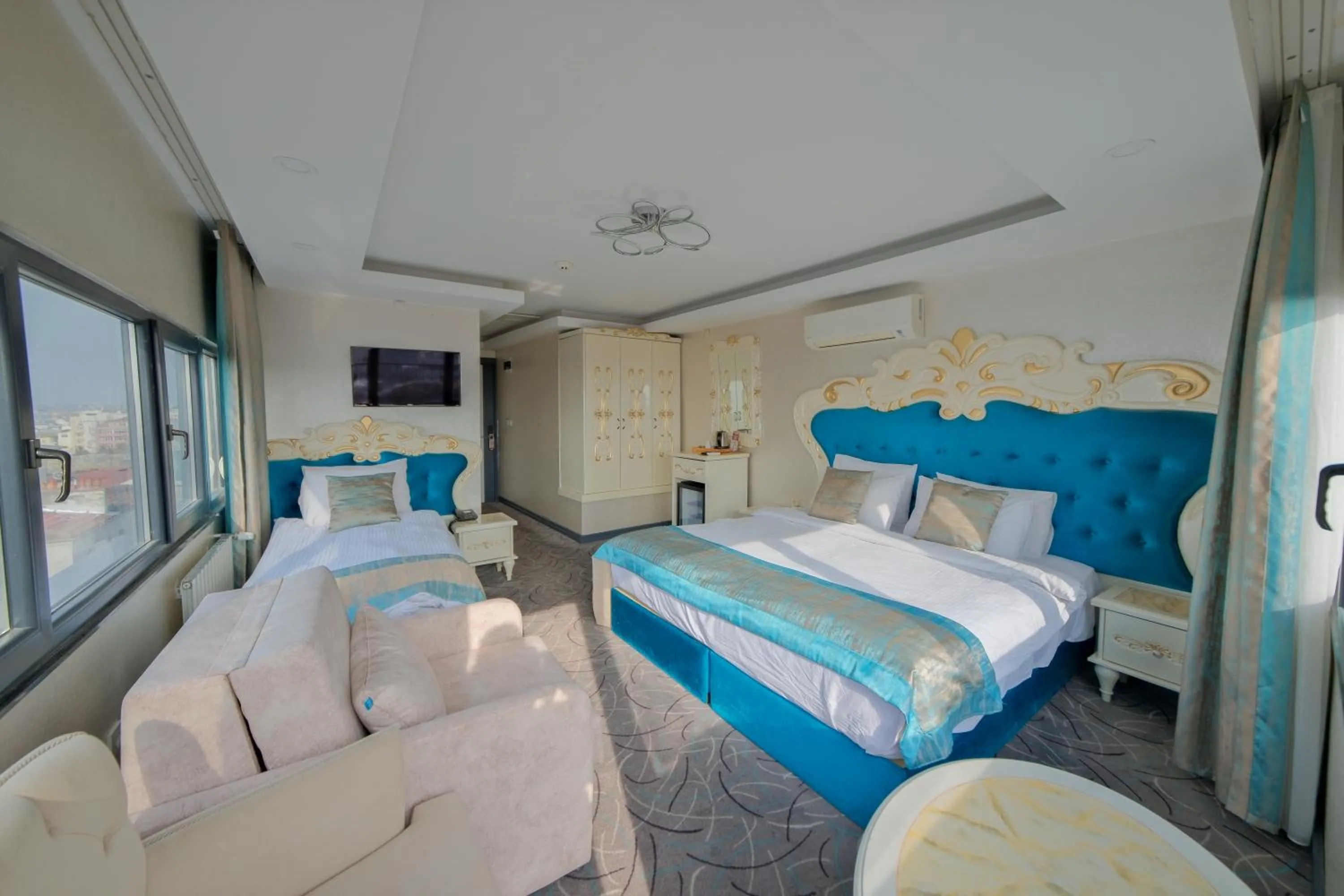 Bed in Grand Kavi Hotel