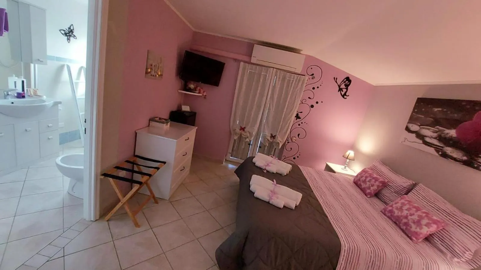 Bed in B&B Villa S Anna Hospitality Solutions