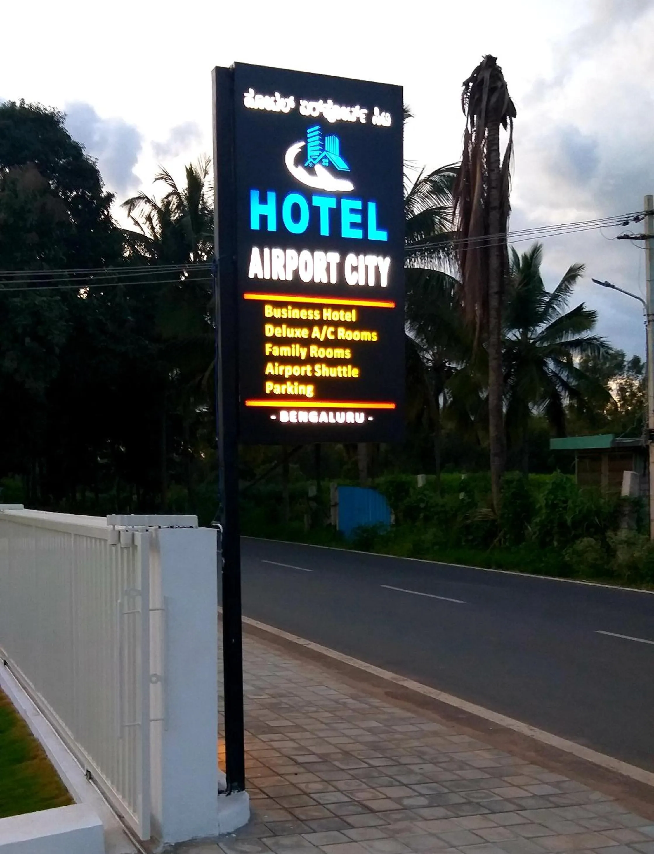 Property logo or sign in Hotel Airport City