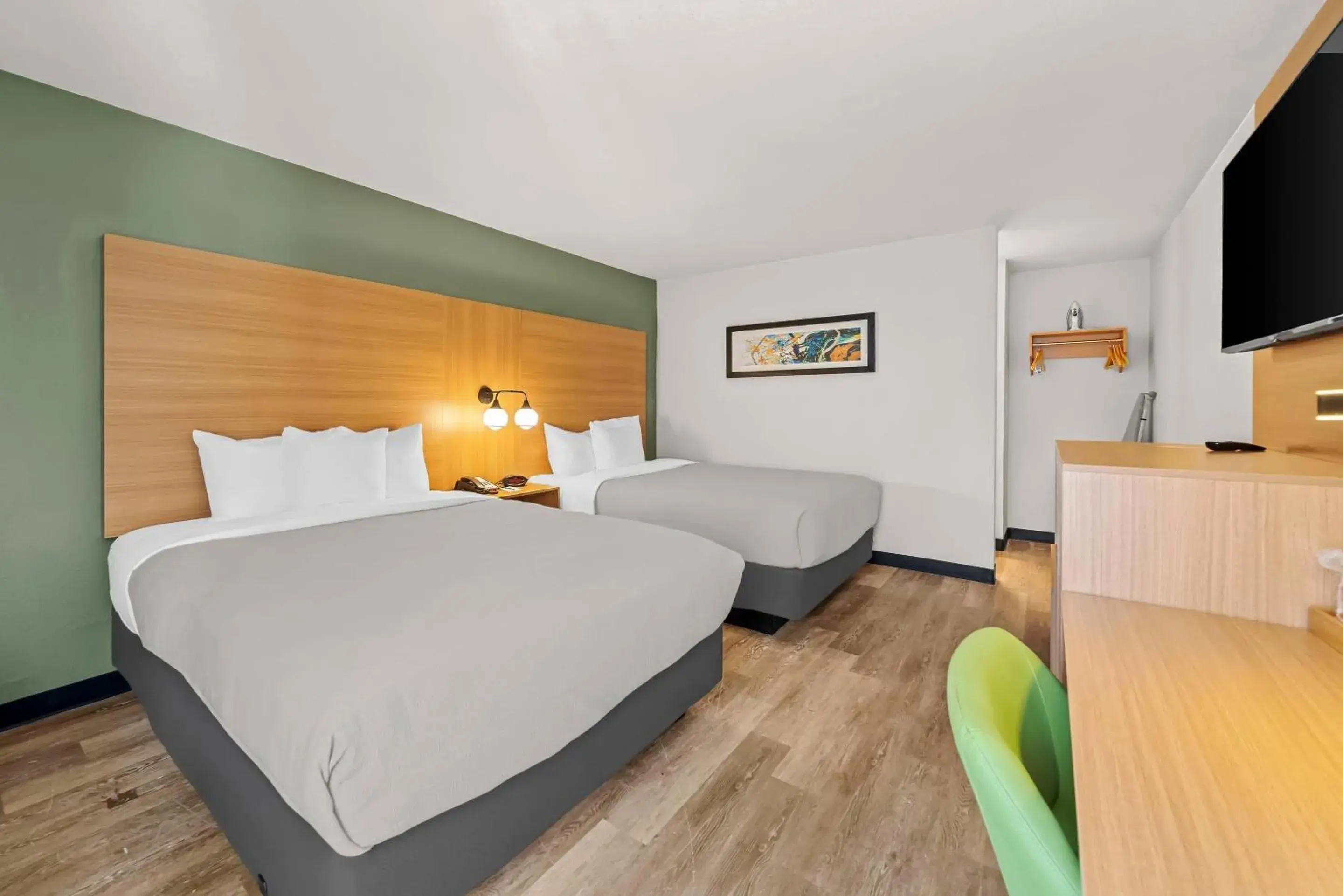 Bedroom, Bed in Quality Inn Orlando Near International Drive Bedroom, Bed in Quality Inn Orlando Near International Drive