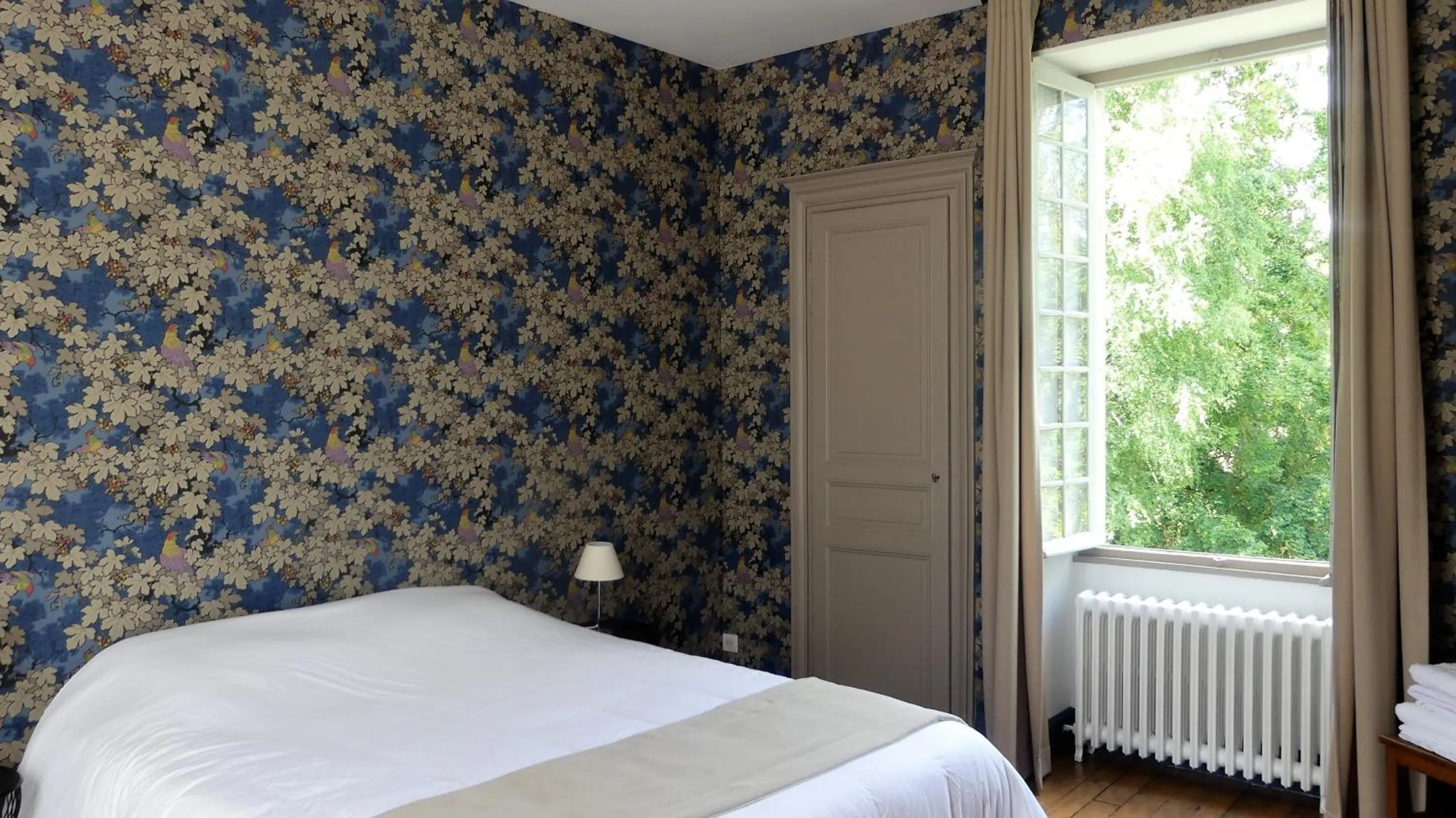 Photo of the whole room, Bed in Maison du Moulin