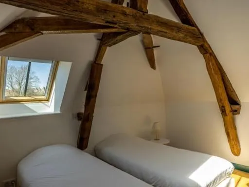 Bed in Maison du Moulin