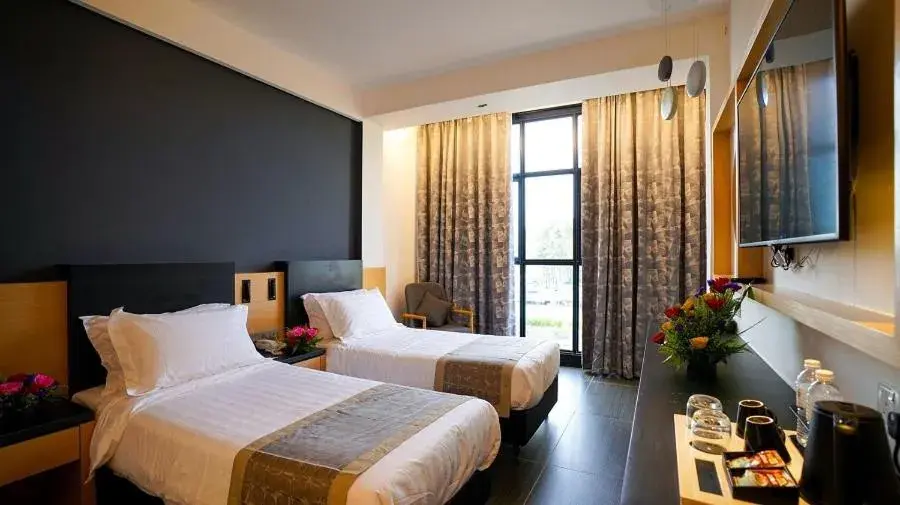 Photo of the whole room, Bed in TSR Seafront Hotel Photo of the whole room, Bed in TSR Seafront Hotel