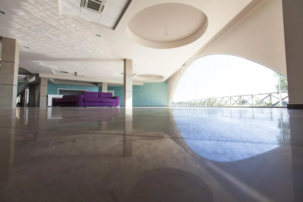 Communal lounge/ TV room in Eco Resort Dei Siriti