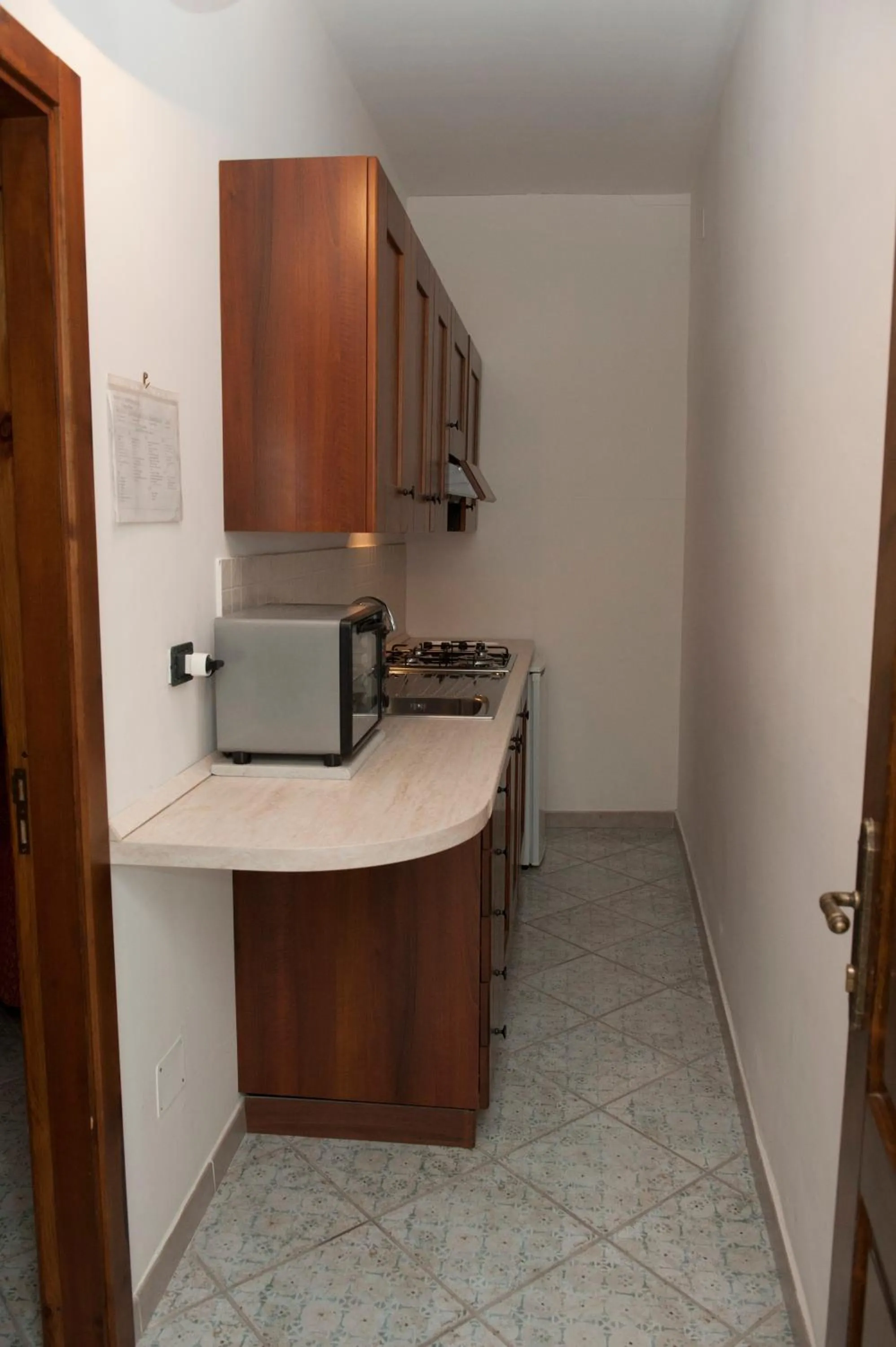 Kitchen or kitchenette in Casa Vacanze - Affittacamere Il Tempone
