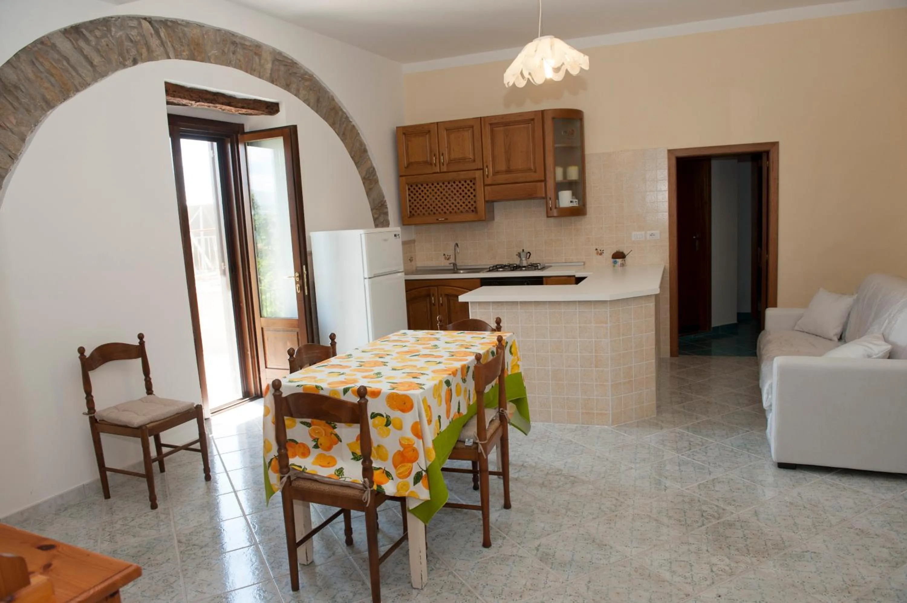 Communal lounge/ TV room in Casa Vacanze - Affittacamere Il Tempone