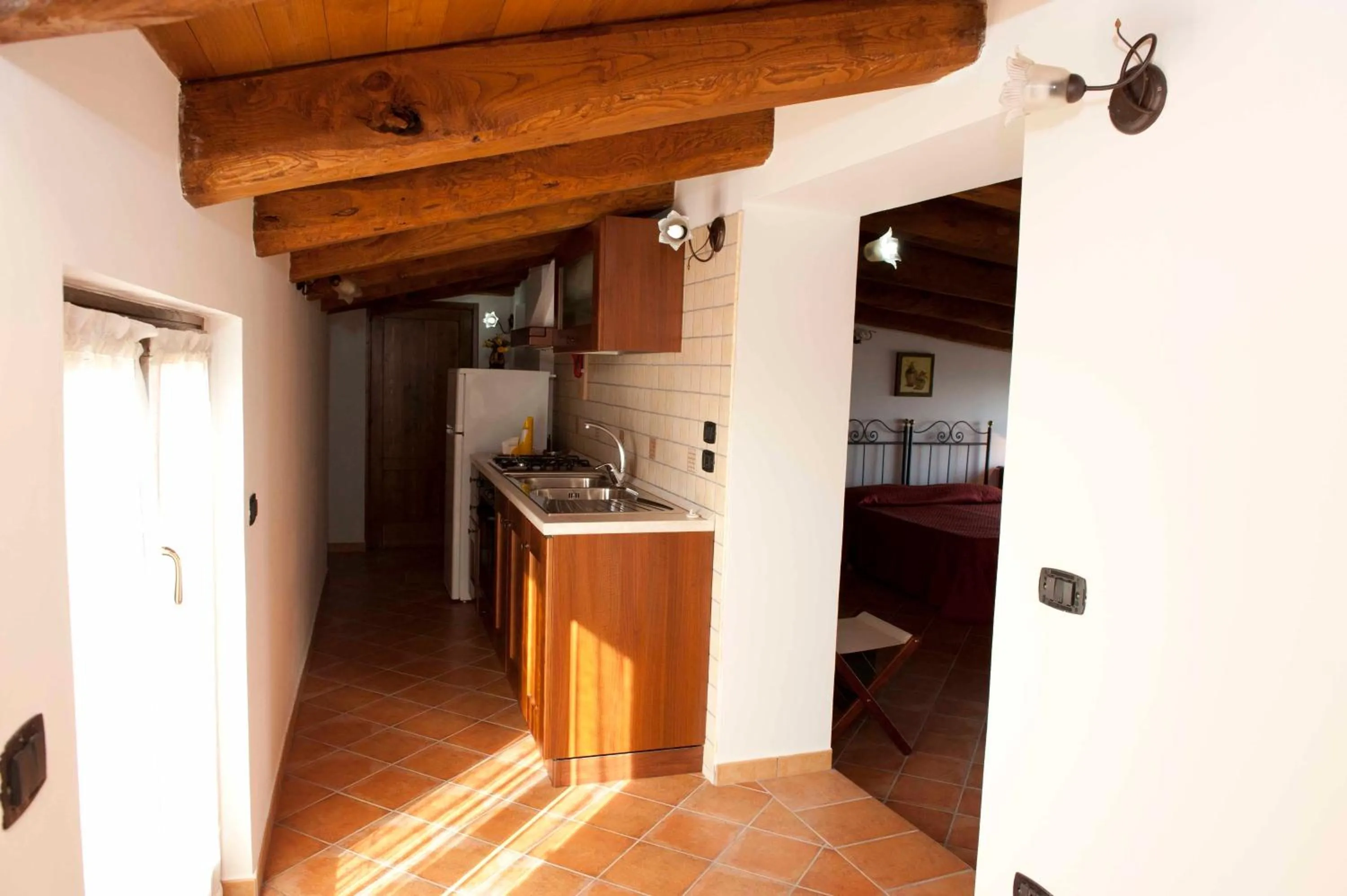 Kitchen or kitchenette in Casa Vacanze - Affittacamere Il Tempone