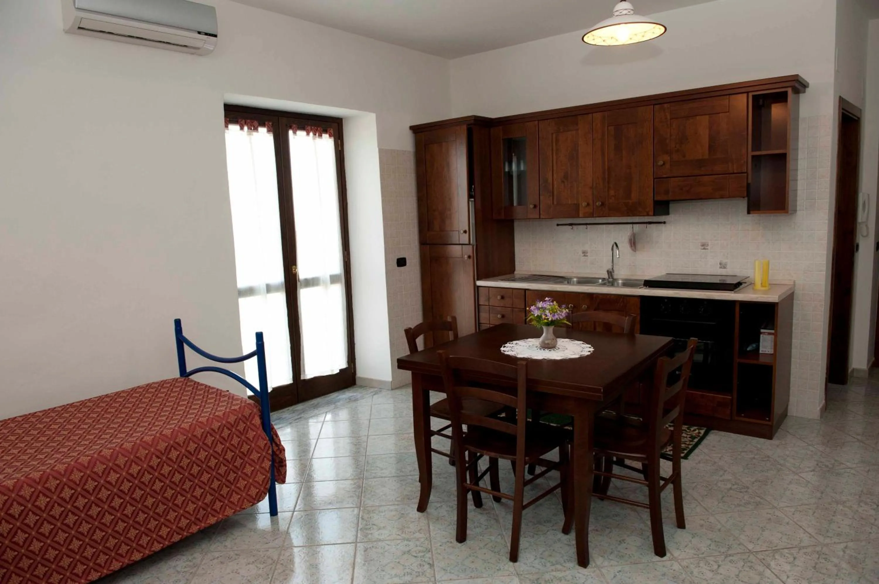 Kitchen or kitchenette in Casa Vacanze - Affittacamere Il Tempone
