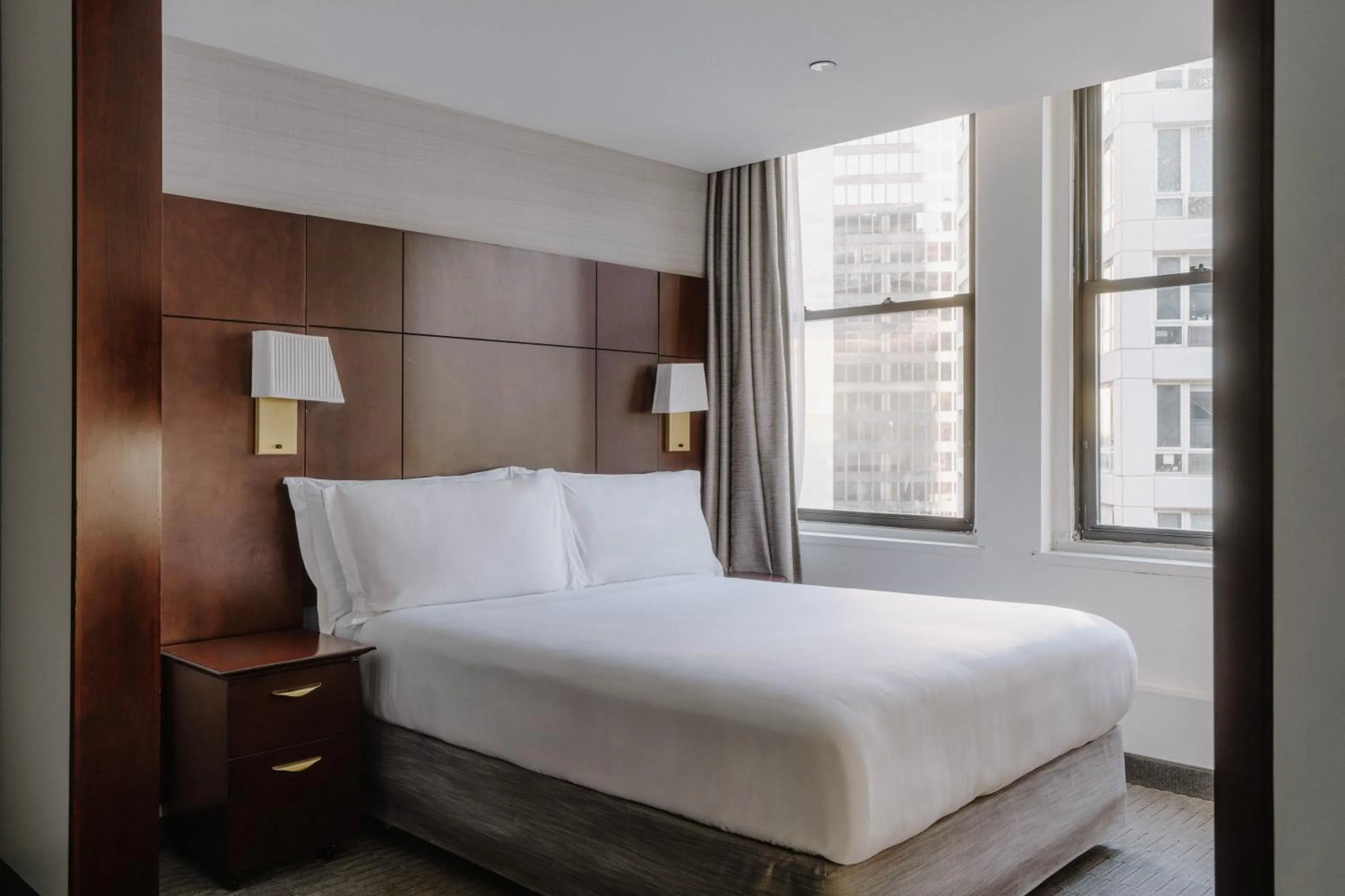 Bed in Club Quarters Hotel Wacker at Michigan, Chicago