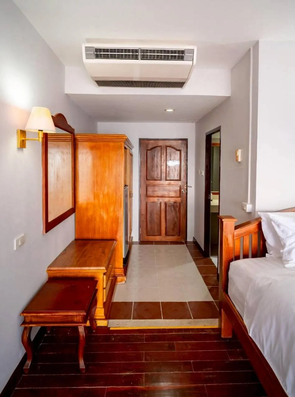 Photo of the whole room, Bed in Jansom Beach Resort