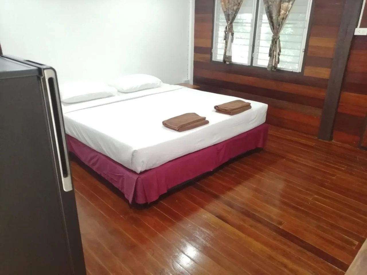 Bed in Jansom Beach Resort